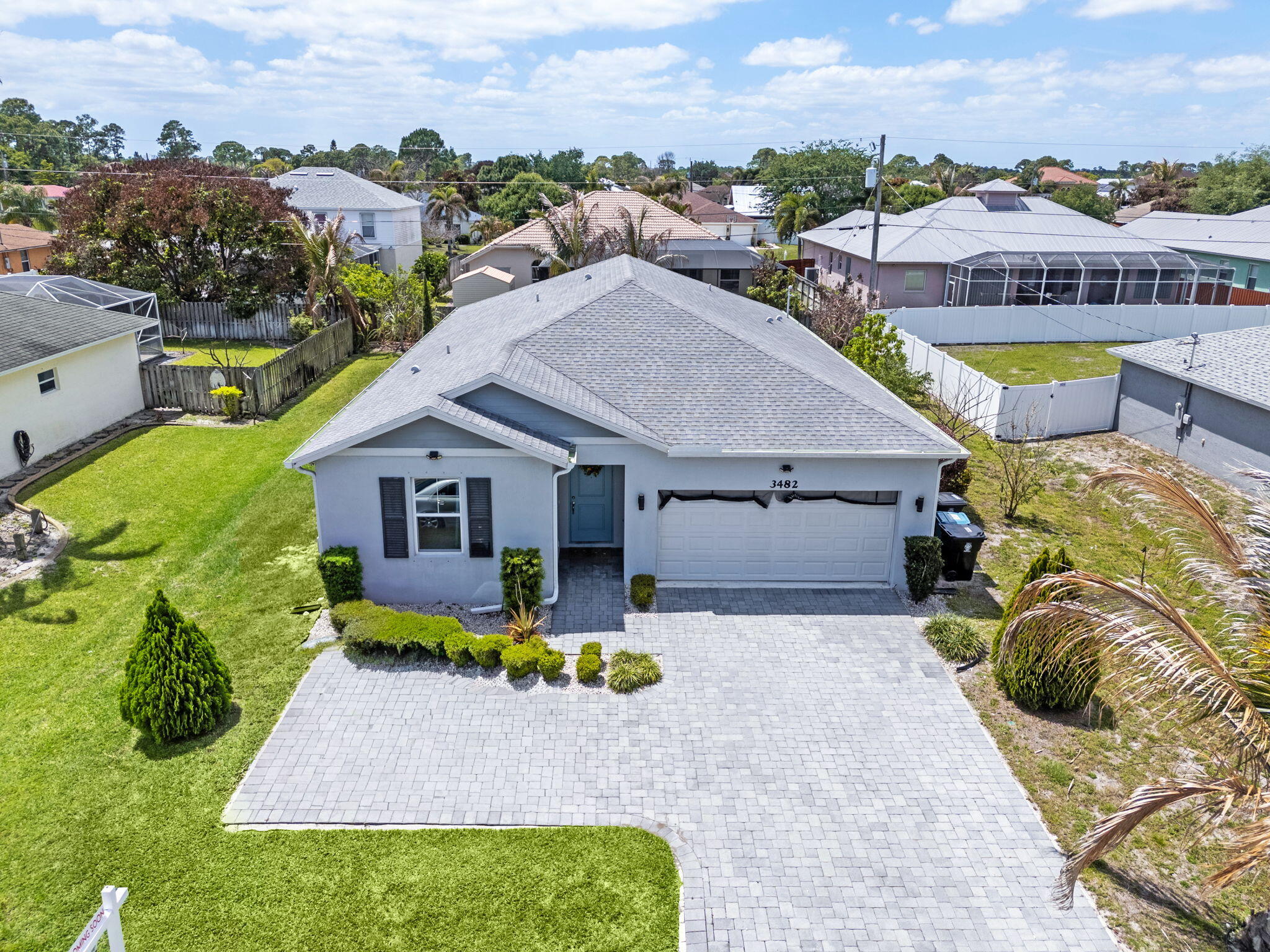 Built in 2021 by Meritage Homes, this stunning 4-bedroom, 2-bath residence offers modern living with no HOA. Designed for comfort and entertainment, the home features over $15,000 in premium audio equipment, creating the perfect atmosphere for hosting or relaxing. Enjoy peace of mind with a full security camera system and smart home technology throughout. The spacious 2-car garage is a standout, complete with a split A/C unit, insulation, and wired speakers—ideal for a workshop, gym, or additional hangout space. Inside, you'll find stylish white shaker cabinets, tile flooring throughout, and a bright, open layout. Step outside to a backyard filled with fruit trees, offering your own private oasis.