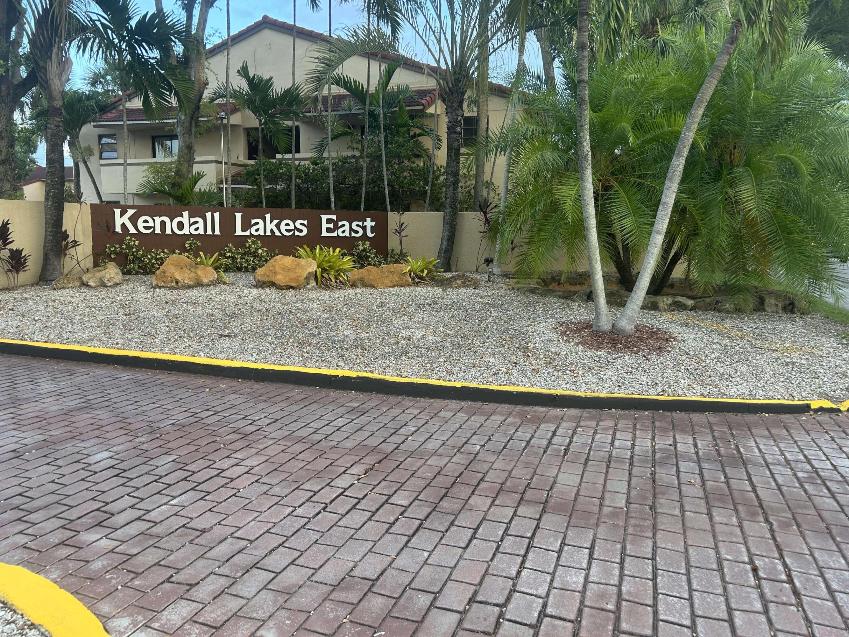 Welcome home to this highly desirable, first-floor corner unit in Kendall Lakes! This spacious 2-bedroom, 2-bathroom condo offers the perfect blend of comfort and convenience. The interior features a highly functional layout, complete with two extra closets for plenty of storage space and an in-unit washer and dryer for your absolute convenience. Stay cool year-round with brand-new remote-controlled ceiling fans installed in the living room, dining room, and each bedroom. The spacious master suite serves as your private retreat, boasting a large walk-in closet and an exclusive, private door leading directly out to the patio, ideal for quiet morning coffees or enjoying a cross breeze. Positioned as a corner unit, you will enjoy extra privacy and ample natural light.  Situated in a beautifully maintained community with a pool, you are just minutes away from shopping, grocery stores, and local dining. Don't miss out on this Kendall Lakes gem!