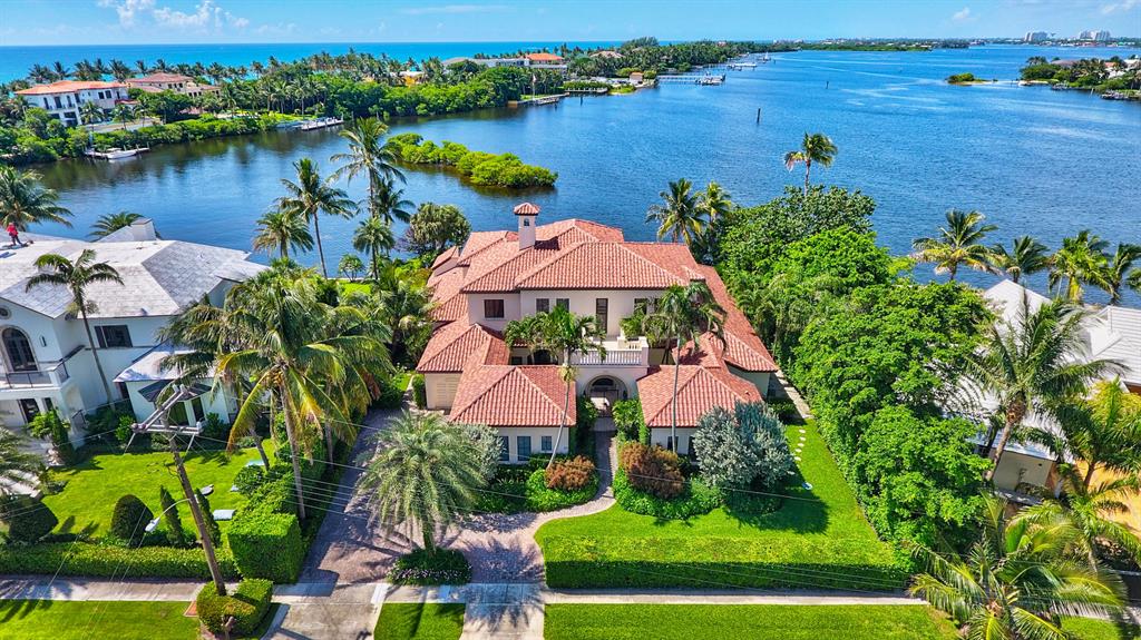 INCOMPARABLE LOCATION!  THIS IS THE HOME ON THE SOUTHERN POINT OF AUDUBON CAY, IN PT MANALAPAN. Masterfully designed exclusive resort like setting with 110' of waterfront. Mile long water views from almost every room. Impeccable condition. Expansive rooms w/ high ceilings. 4 large balconies. The nearly 1200' Master Suite w/ his & hers baths is on the  main level. Updated top of the line chef's kitchen featuring Wolf & Subzero.  Impact glass w/ house generator. Enjoy the outdoor veranda with cooking facilities,  fireplace &  private outdoor shower. Laundry on both levels. Private &  exceptionally secure. 24 hour staffed guard house at neighborhood entrance.  Boat 1 mi to the inlet.  Private aviation 5mi/15min.  Commercial aviation 12mi/25min.  LaCoquille Beach Club privileges included.