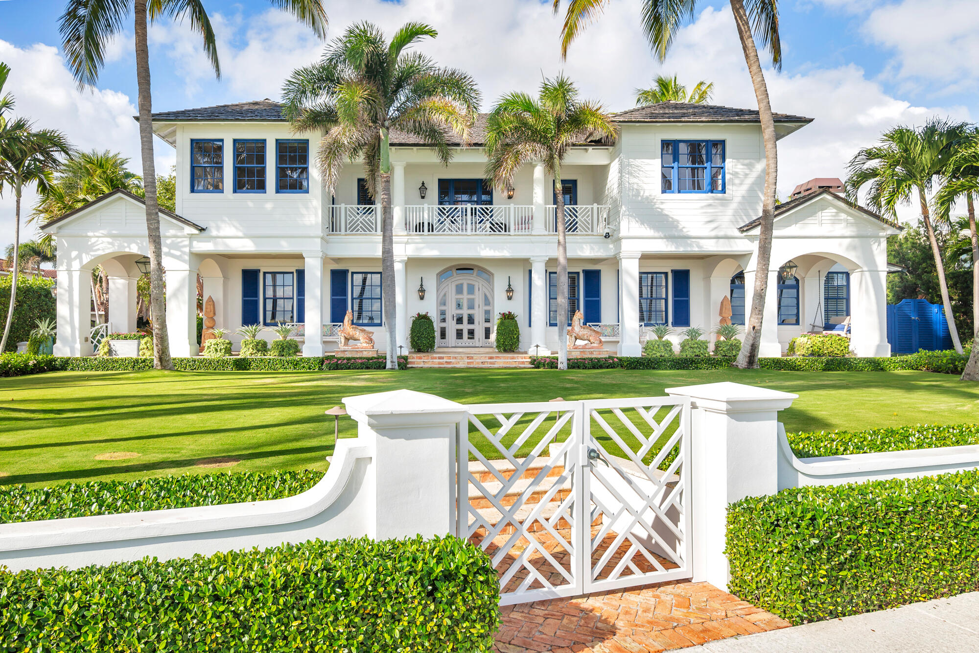 Regarded as the Jewel of South Flagler, this beloved waterfront residence sits on over a half-acre of prime Intracoastal property with over 130 feet of water frontage, celebrated for its striking architecture and inspired design.

Originally envisioned by Roy & Posey Architects and completed by Island Construction in 2013 and now fully-transformed and elevated by the world-renowned Robert Trown and Associates, the estate spans over 9,000± square feet under roof and is composed of a main residence complemented by a separate guest house. The primary home includes five bedrooms and four and a half baths, with a first-floor bedroom currently enjoyed as an office, and a separate one-bedroom guest house replete with a full kitchen, vaulted ceilings, and private balcony. Oriented to capture wide-water views, the main living areas offer an open family room flowing into an eat-in kitchen, appointed with imported custom Italian cabinetry and a dramatic rare imported blue Sodalite island. The formal dining room frames the Intracoastal, while expansive glass doors open to covered loggias to create an effortless indoor-outdoor rhythm.

The owner's suite is light-filled and airy, featuring panoramic views and balcony. Throughout, curated designer finishes and custom dramatic light fixtures add definition and artistry to every space.
Outdoors, the property lives as a private resort, with a heated pool and spa, generous terraces for lounging and dining, and a backyard oasis highlighted by an artistic living wall. The private dock includes a 50,000-pound boat lift, accommodating substantial vessels with ease.
A detached guest house with private entry, full kitchen, and studio-style living/sleeping space provides ideal accommodations for guests or extended stays.
Located minutes from beaches, the Flagler Drive waterfront path, PBIA, dining, shopping, and .9 miles from Mar A Lago, this offering represents waterfront living at its most refined, architecturally significant, beautifully finished, and rarely available.



DISCLAIMER: The written and verbal information provided including but not limited to prices, measurements, square footages, lot sizes, calculations and statistics have been obtained and conveyed from third parties such as the applicable Multiple Listing Service, public records as well as other sources. All information including that produced by the Sellers or Listing Company are subject to errors, omissions or changes without notice and should be independently verified by any prospect for the purchase of a Property. The Sellers and Listing Company expressly disclaim any warranty or representation regarding all information. Prospective purchasers' use of this or any written and verbal information is acknowledgement of this disclaimer and that Prospects shall perform their own due diligence. Prospective purchasers shall not rely on any written or verbal information provided when entering a contract for sale and purchase. Some affiliations may not be applicable to certain geographic areas. Copyright 2023 Listing Company. All Rights Reserved.