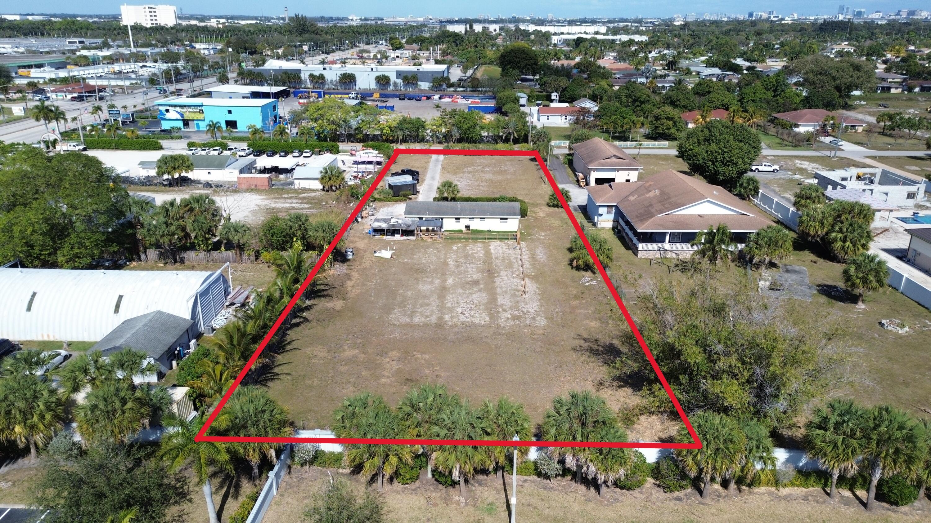 Over one acre of land in the center of West Palm Beach in Unincorporated Palm Beach County. The Urban Infill (UI) zoning allows flexibility for mixed use projects. Multifamily and Commercial projects are allowed. Rented 3 bedroom 2 baths single family home on site. Enjoy rental income while getting entitlements and approvals. Buyer to do own due diligence.