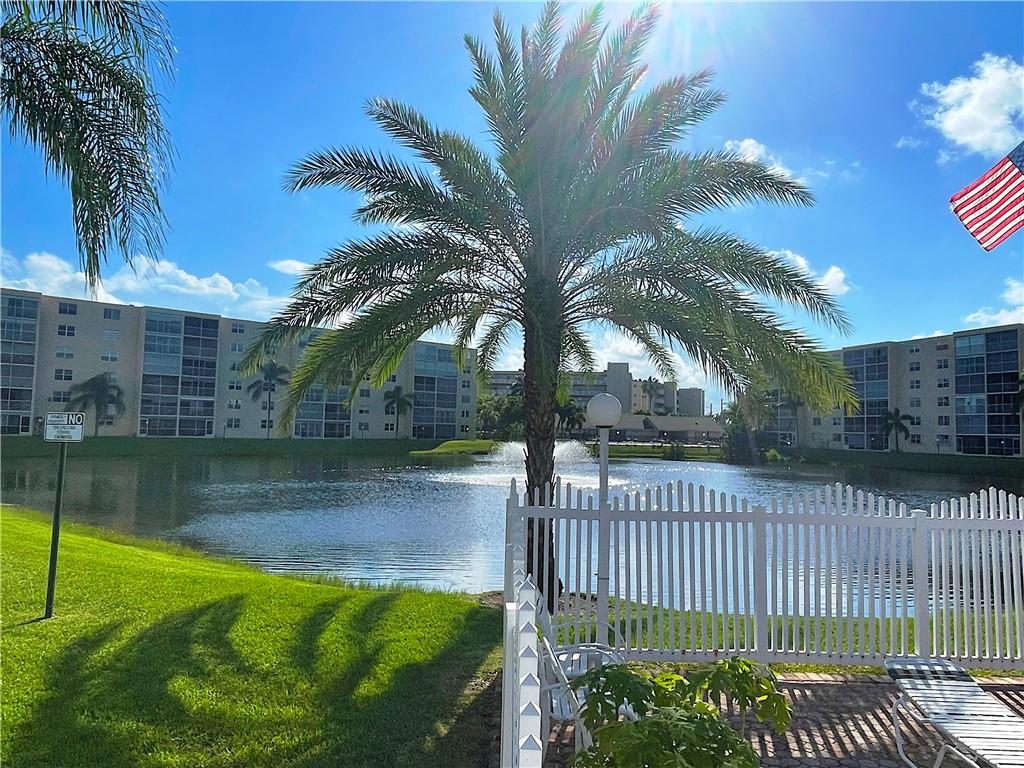 Lakefront Ground Floor unit in sought after Meadowbrook Lakes. Almost 1200 Square feet under air. ALL AGES WELCOME! Now Vacant and easy to Show. Impact windows in Bedrooms and Kitchen. Shutters for all windows as well. Centrally located in the heart of S.E. Dania Beach. Walking Distance to Grocery, Dania Beach Casino. under 5 minute drive to FLL Airport, Port Everglades, Dania Pointe, and the newly enhanced Dania Beach Pier! Enjoy Gorgeous sunsets from a lakefront screened patio, enjoy the Swimming pool all year round as well as community activities.