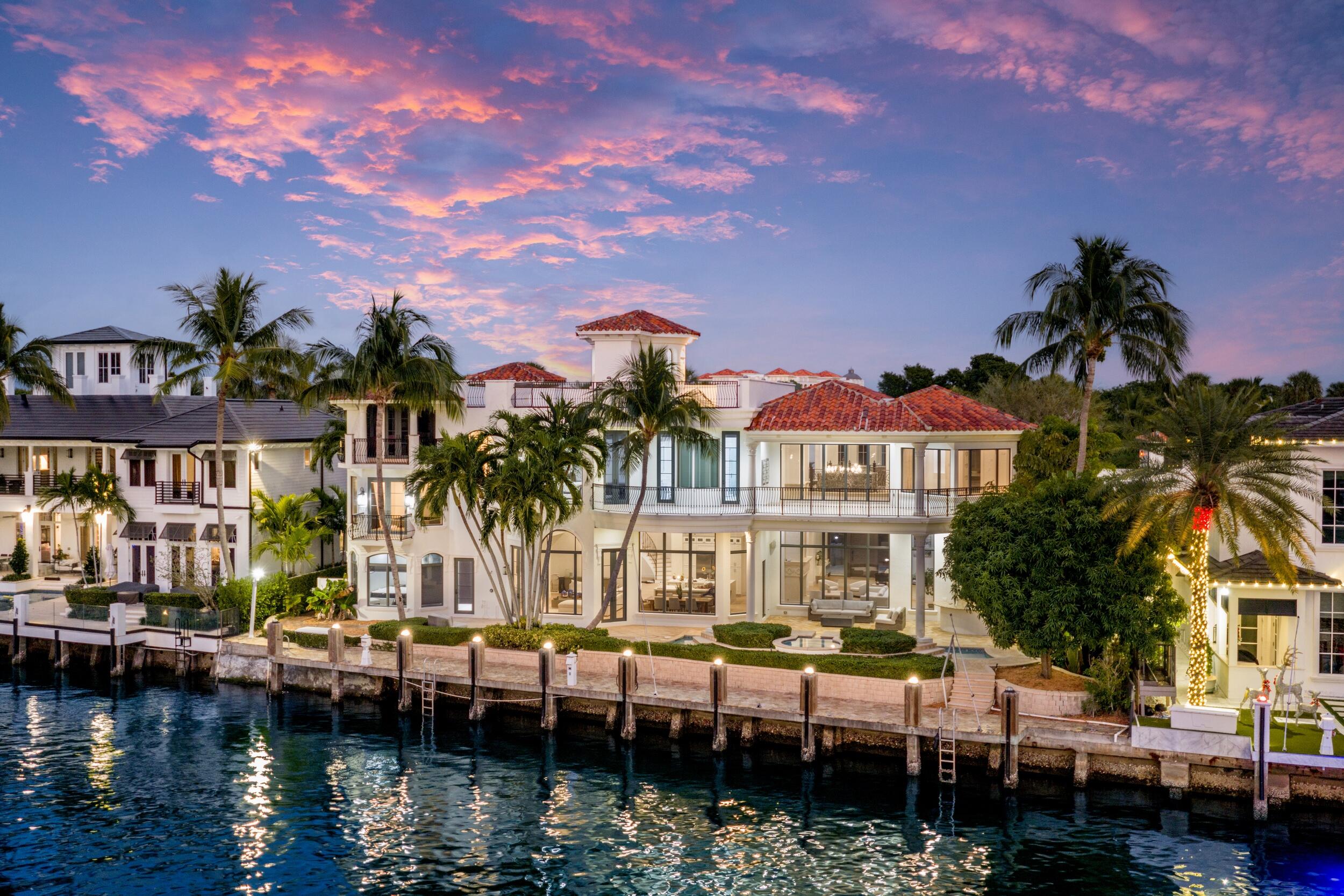 Boca Raton Trophy Estate boasting 115± feet of ''no wake'' waterfrontage for your Yacht. Situated directly on the Intracoastal, in the most prestigious section of Boca Raton just off Lake Boca and the Inlet.   

This fabulous 9,300 +/- living-square-foot home with 6/BR-7.3BA is a decorator's dream. With soaring coffered ceilings, the open floor plan with spectacular natural lighting makes this bright home interior perfect for entertaining. For the yachtsman, your deep-water dock is inside the ''No Wake'' zone and provides safe harbor as well as easy access to open waters. It's a boaters dream come true. You'll love the recent updates and upgrades throughout the home, especially the large new double island gourmet kitchen with top-tier appliance package that serves as both a prep area and a comfortable breakfast bar. The appliances are stainless steel with a hooded 6-burner gas stove. This is a fantastic estate on a trophy lot located in the heart of Boca Raton.

Additional features include:

- 1,700± sq ft rooftop sky deck with panoramic views for large gatherings. 
- Mansion-like estate with reimagined interiors.
- Wide-plank bleached hardwood floors on the main level.
- Luxe primary suite with dual baths and private balcony. 
- Waterfront office with lounge
- Theater and media room + Two Family Rooms + Club room.
- Resort-style pool with step-up spa, entertainment loggia with summer kitchen and cabana.
- Car collectors showroom garage can accommodate up to 10 vehicles with 14' coffered ceilings. 
- Direct Intracoastal access to the ocean with no bridge through to inlet.

Situated at the south end of the barrier island, just a short stroll from Boca Beach and Palmetto Park Road's restaurant row, and minutes from Royal Palm Place and Mizner Park's world-class shopping, dining, and entertainment. Boca Raton's private executive airport is 4± miles away, with Palm Beach and Hollywood/Fort Lauderdale International Airports just a 30± minute drive.
Enjoy the best of South Florida beaches, Red Reef Park, and nearby golf courses. Golf, tennis, yachting, and spa enthusiasts will appreciate the world class Boca Raton Resort & Club, a Waldorf Astoria Collection. This estate epitomizes luxurious waterfront living and the South Florida lifestyle. 
Residents of Por La Mar experience private armed security 7 days a week, the only non-hoa East Boca community to provide this safety. 
Shown by appointment only. 

The information published and provided including but not limited to prices, measurements, square footages, lot sizes, features, finishes, and calculations are subject to errors, omissions or changes without notice. All such information should be independently verified. All parties should perform their own due diligence to verify all information.