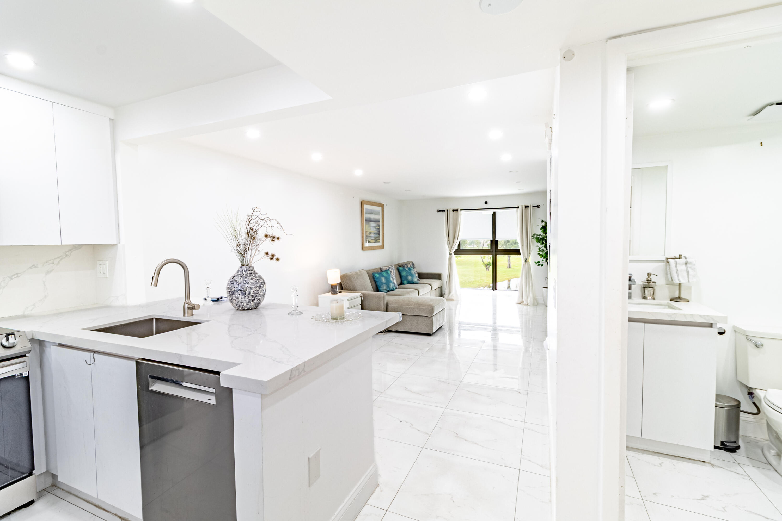 Beautifully remodeled waterfront condominium located in the highly sought-after Sunrise Lakes community. This move-in-ready 2-bedroom, 2-bath residence offers the perfect blend of comfort, style, and peaceful water views. Step inside to discover a tastefully updated interior featuring a modern kitchen with contemporary cabinetry, quartz countertops, stainless steel appliances, and renovated bathrooms designed with elegant finishes. Impact-resistant windows provide peace of mind, energy efficiency, and abundant natural light throughout the home. Enjoy tranquil waterfront views from the comfort of your living space while taking advantage of the resort-style amenities that make Sunrise Lakes such a desirable place to call home. Whether you're looking for a year-round residence or a seasonal retreat, this meticulously maintained condo offers exceptional value and convenience. Located close to shopping, dining, entertainment, medical facilities, and major highways, this home combines a serene setting with everyday accessibility. Don't miss this opportunity to own a beautifully updated waterfront condo in one of Sunrise's most established and active communities. Schedule your private showing today!