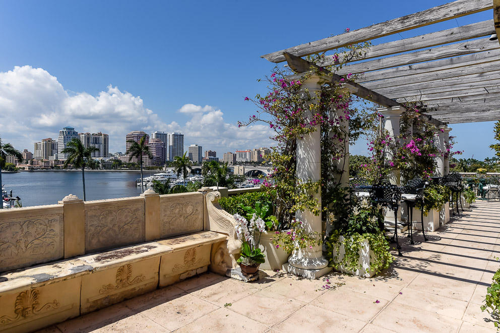 Sweeping Intracoastal views from the penthouse at Park Place. Designer ready unit featuring 3BR/3BA, formal dining room, and living room with bar. Oversized wrap-around balcony with pergolas, a covered patio, and yacht views.