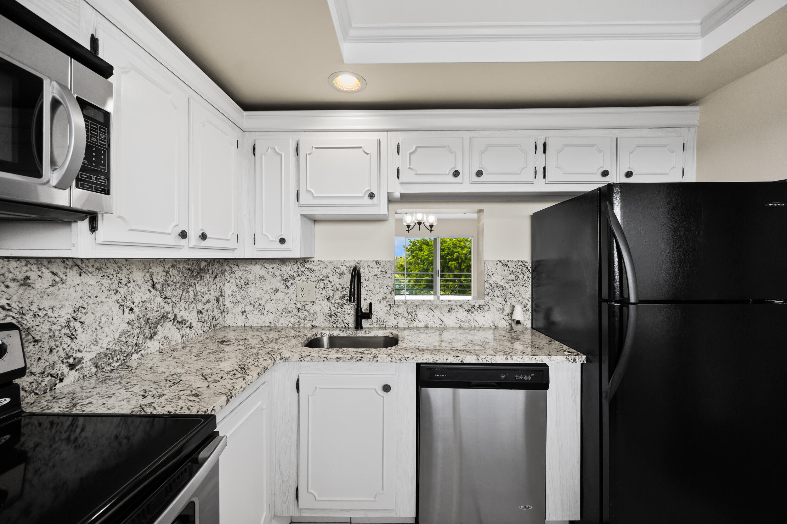 Welcome home to this bright, freshly updated condo. It features new paint, clean tile floors, a beautifully remodeled bathroom with a walk-in shower, and a modern kitchen with new granite countertops, backsplash, and stainless steel appliances. Enjoy relaxing on your private balcony with views of the tennis courts, pickleball court, clubhouse, and palm trees. Rent includes water, sewer, trash, cable TV, Wi-Fi, and access to community amenities (per association rules). This is a 55+ community. No pets allowed.