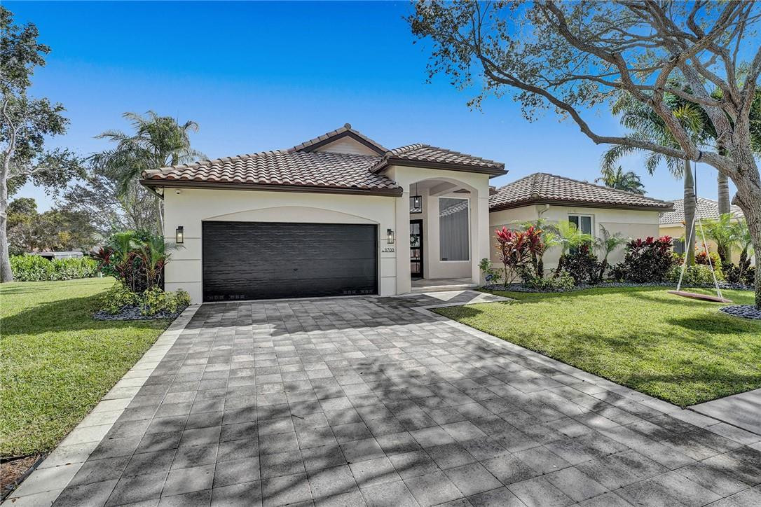24/7 guard gated community in beautiful Lake Estates. Welcome to this over-sized corner lot introducing a large & open floor-plan. Grand foyer entry with 4BR & 3B. Courtyard-style pool home. No expense spared with the pride of ownership on display. Entirely upgraded smart-home. Full home camera system also equipped with a complete lighting system throughout. All hurricane impact doors and windows. Completely turn-key and ready to go. Heated, salt water pool with turf and pavers in the backyard. Huge side yard with new lush landscape. Don't miss the opportunity to own this impressive and inviting estate. Centrally located to major highways and shops, brand new hospital 1-mile away, Grand Oaks Golf Club and A-rated schools! This is the total package.