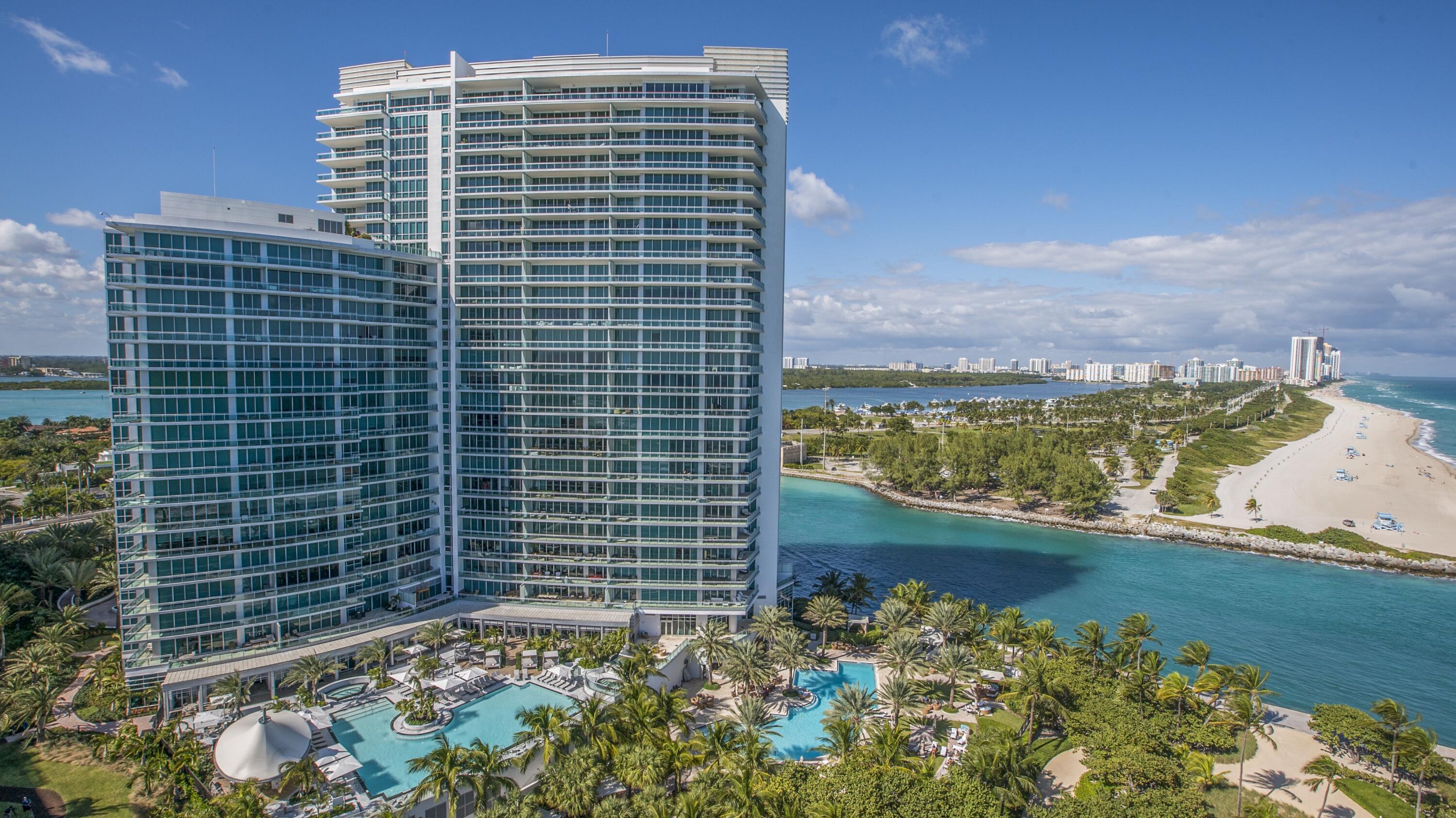 Exceptional Southeast corner residence with breathtaking unobstructed views of the ocean, Intracoastal, and Miami skyline. This expansive oceanfront layout offers sunrise-to-sunset living with wrap-around terraces and panoramic south, east, and west exposures. Meticulously finished with floor-to-ceiling glass. Primary bedroom offers spacious designer walk in closets and an elegantly appointed bath retreat.  Enjoy world-class Ritz-Carlton resort amenities including beachfront pool and spa, fitness center, concierge, valet, direct beach access, and poolside service. Ideally located just moments from the renowned Bal Harbour Shops and exceptional dining.