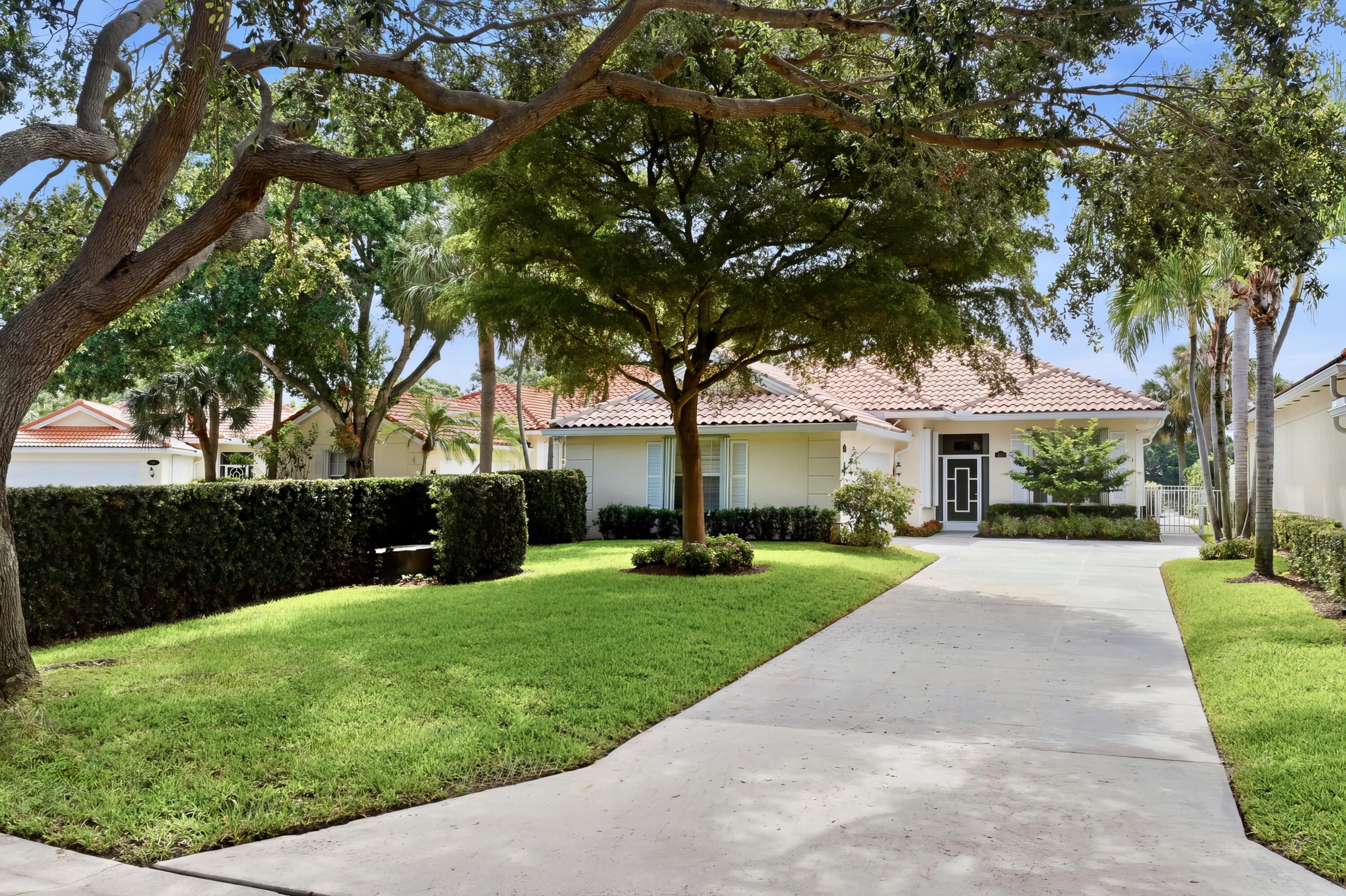 Immaculate Lakefront Oaks East home on Cul De Sac. Long Driveway with beautiful landscaping, Gorgeous Limestone kitchen counters & state-of the-art appliances. Updated bathrooms, plantation shutters & designer fans. Italian porcelin tile & custom crown molding throughout. Neutral color palate is both relaxing and inviting. Classic & contemporary in the same breath. Robust Screened patio with running bond design pavers & accordion shutters. Impeccable home with beautiful, peaceful lake views. Oaks East is a terrific development in the best location. 10 minutes to the beach & 15 minutes to the airport. Close to all the shopping at the Gardens Mall, ''Downtown'' shoppes & all the casual & fine restaurants along PGA Blvd. Beautiful Lakefront home. Peaceful, private, perfect location