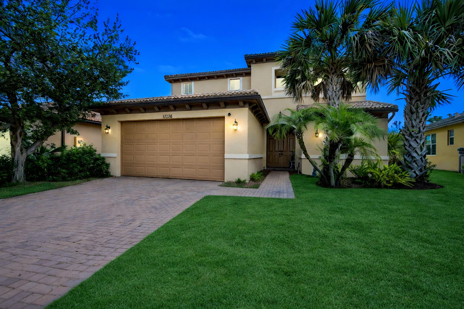 SELLER IS RELOCATING DUE TO WORK. WILL CONSIDER ALL REASONABLE OFFERS.  4 bedrooms + loft upstairs, 2.5 bathroom and 2 car garage.  Large backyard w/ plenty of room for a pool. Located on a quiet street yet minutes from 90% of your daily needs, including supermarket, gas stations, banks, restaurants, Cleveland Clinic, Home Depot, easy access to I-95 and so much more. TownPark at Tradition is located within the Master Planned community of Tradition with its Town Square and small town feel. Enjoy the scenic lakes and bridges, take your dog to the dog park, play in the green areas, exercise on the walking paths and ride your bike on the oak lined boulevards with bike lanes. TownPark at Tradition offers resort style amenities. 35 minutes from beautiful beaches. Buy a home and get a community.  Recent enhancements add both comfort and efficiency, including a new, water-efficient half bath toilet (installed 6 months ago), along with an updated mirror and added wall shelving. New light/fan fixtures have been installed in both the downstairs bedroom and one of the upstairs bedrooms, enhancing both style and functionality. Custom storage solutions include a built-out closet in the secondary bedroom and a custom-designed, oversized walk-in closet in the primary suite, offering exceptional organization.  Upstairs, the primary suite serves as a relaxing retreat, while two additional bedrooms provide flexibility for guests, a home office, or additional living space. The garage is equipped with built-in shelving units, providing convenient storage.  Enjoy outdoor living in the fully fenced backyard, enclosed with a durable bronze aluminum fence and featuring two locking 4-foot gates for easy access, ideal for both privacy and functionality.  As a resident of TownPark at Tradition, you'll enjoy access to resort-style amenities including a clubhouse, fitness center, pool, tennis courts, and more—all within a beautifully maintained gated setting. Conveniently located near shopping, dining, and the renowned Cleveland Clinic Tradition Hospital, this home offers the perfect combination of comfort, upgrades, and location.