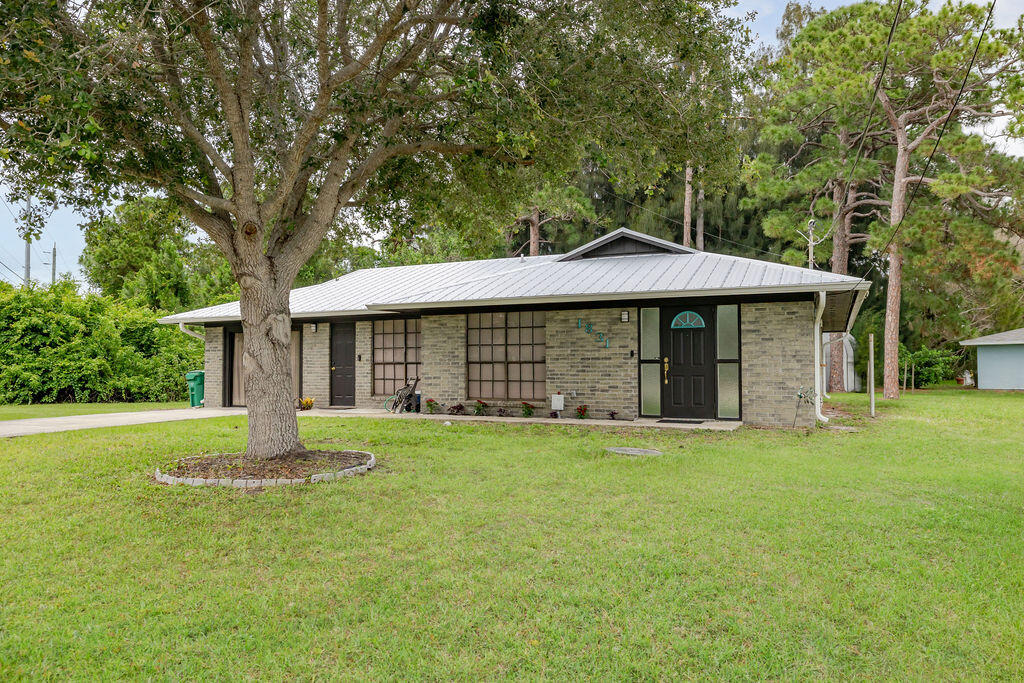 Welcome to this charming and well-maintained CBS ranch home situated on a spacious corner lot in a convenient location close to shopping, dining, and the natural beauty of Savannas Preserve State Park. Offering a flexible floor plan, this 3-bedroom, 2-bath residence features additional living space that has been utilized as a 4th bedroom, complete with a Jack-and-Jill bath, providing excellent options for guests, a home office, hobby room, or multi-generational living. The property is connected to city water and also includes a private well. Whether you're looking for a primary residence, seasonal retreat, or investment opportunity, this versatile home offers comfort, space, and an excellent location.