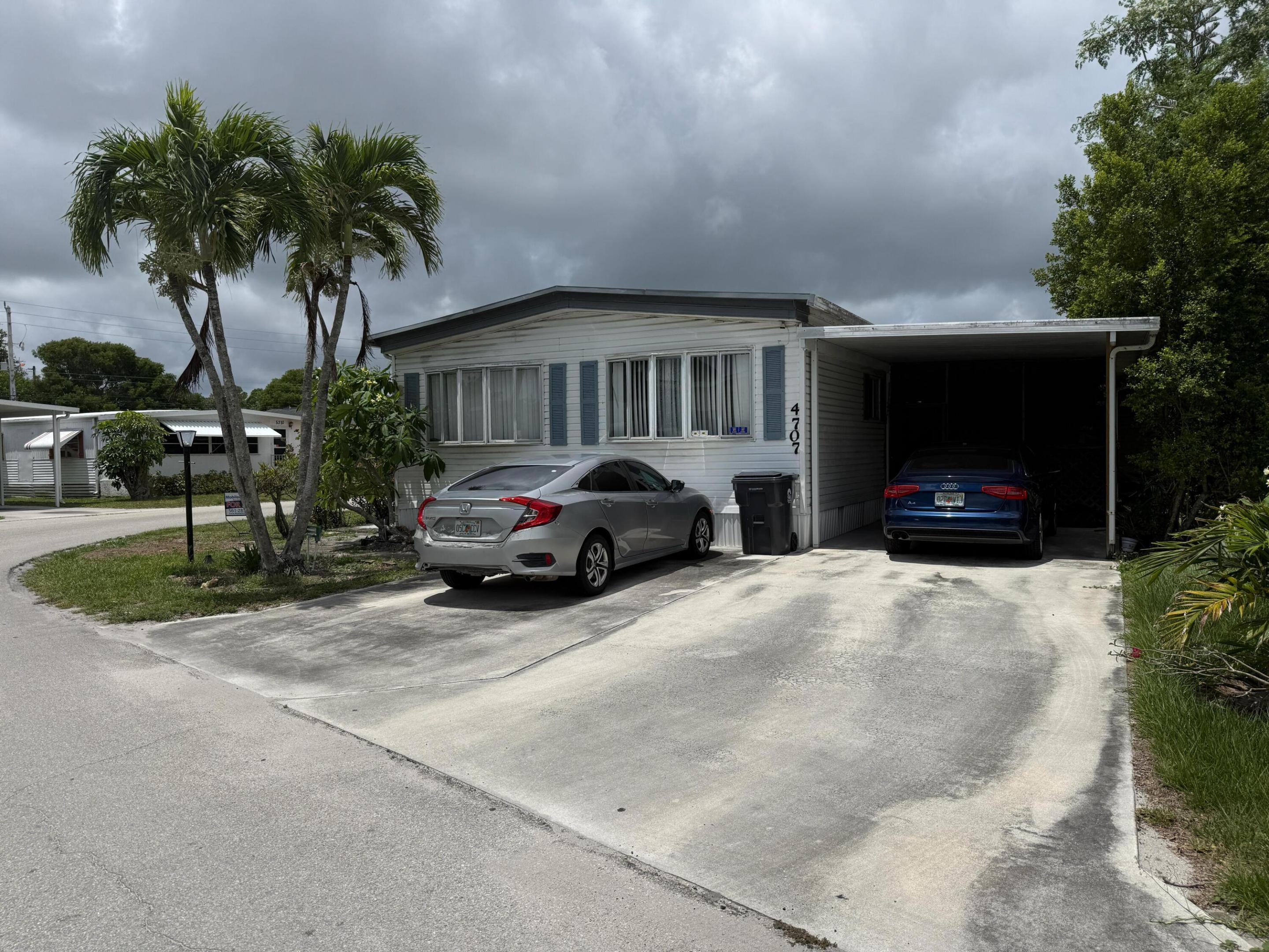 Charming remodeled  3 bedroom 2 Baths, Mobile home in Lake Worth village, a community for all ages, It offers the perfect combination of comfort, modern design, and functionality. Modern kitchen with upgraded features, freshly painted interior. All measurements are approximate. This property IS available for purchase with financing or Cash. Call the Listing agent today to schedule your private tour