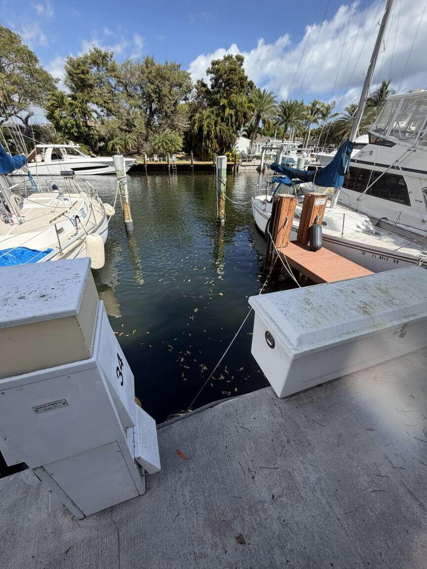 Rare opportunity to own a deeded deep-water boat slip in the highly desirable Sun Harbor Marina in Pompano Beach. Slip #62 offers one of South Florida's most sought-after boating locations with no fixed bridges and only minutes to the Hillsboro Inlet and the Atlantic Ocean, making it ideal for fishing, cruising, or weekend boating. Premium Features: TideSlides® floating dock system keeps your boat centered and protected as the tide rises and falls, reducing stress on dock lines and making boarding easier in changing water levels. Water and electric service at the slip This slip accommodates boats approximately 35-36 feet in length and offers easy maneuverability within a protected marina basin. Owners enjoy quick access to open water while benefiting from a secure, well-maintained marina  environment. Features Deeded ownership Slip #62 Accommodates vessels up to approximately 35-36 feet Deep-water dockage No fixed bridges Minutes to Hillsboro Inlet Fast ocean access Protected marina basin Excellent location near Lighthouse Point Ideal for sportfishing boats, center consoles, express cruisers, and day boats Great investment or personal use Whether you're looking to eliminate marina waiting lists, protect your boat close to the inlet, or own a valuable piece of South Florida waterfront real estate, this is an exceptional opportunity.