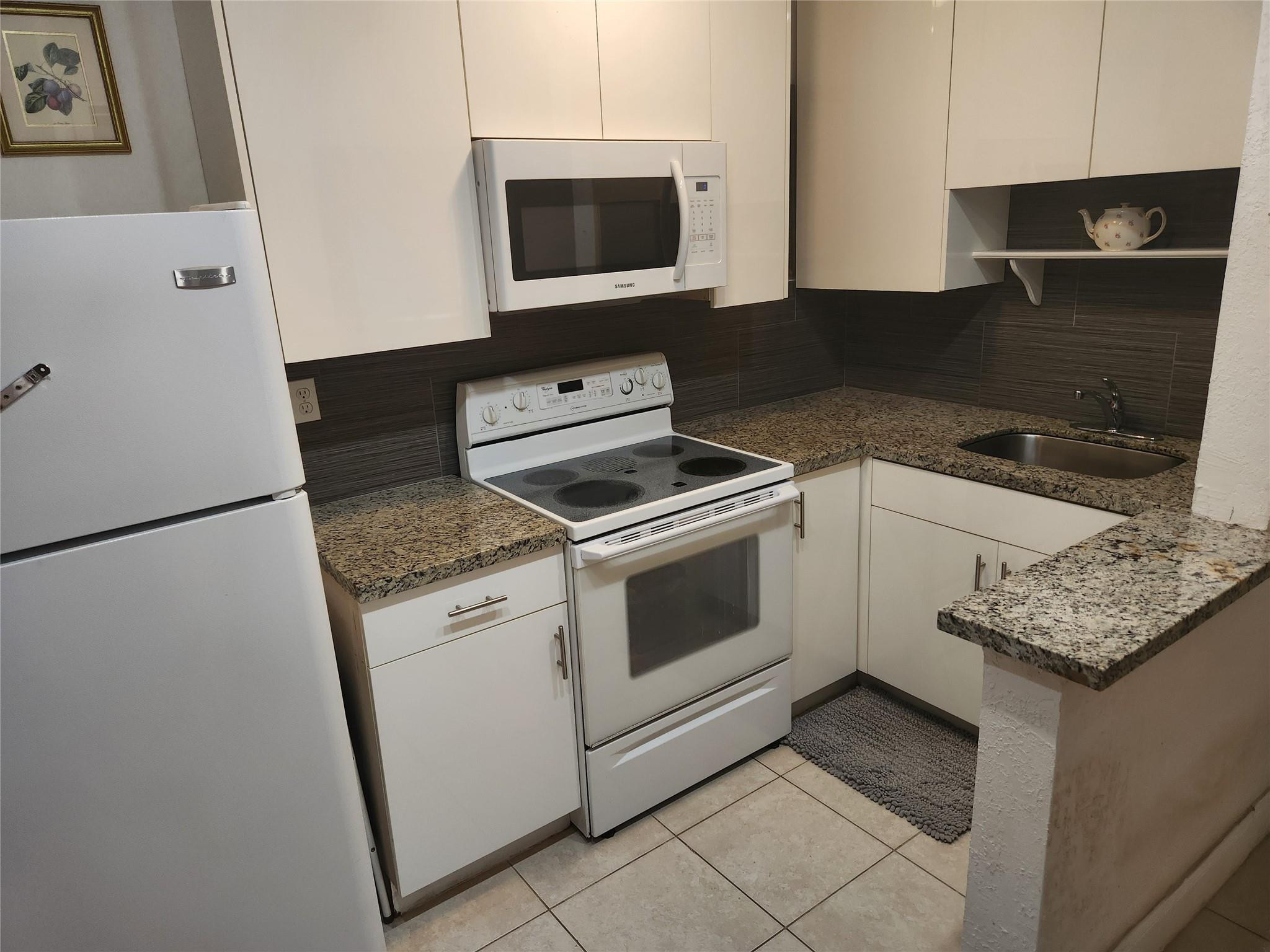 PET FRIENDLY! DOG PARK one block away! Super cute single family home for annual rent. Updated two bedroom, one bath with an oversized bonus room that can be used as a den, office or extra space for guests! All impact windows keeps your electric bill down and keeps you safer! New split A/C units! All tile floors. Microwave doubles as a convention oven. Energy toilet for low water usage. Large fenced in yard with room for swings, kiddie pool or garden! Cute covered front porch to relax, Mango tree, carport and extra parking are just a few of the extra touches you will appreciate! Seller will take care of the lawn. Pets allowed on a case by case basis!  2 sheds on property for extra storage! Unfurnished!