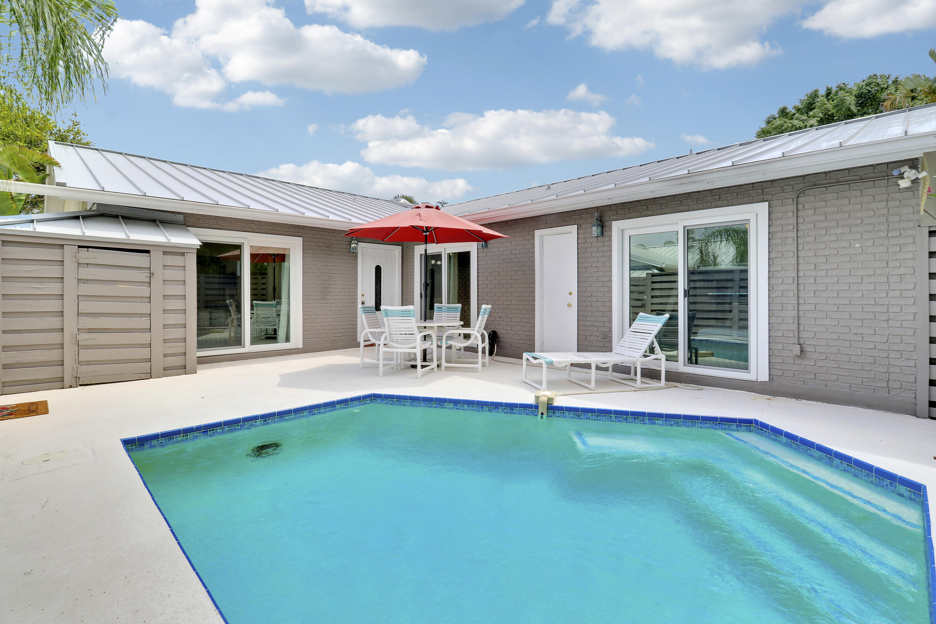 E-Z Coastal living awaits you in this updated one story villa WITH PRIVATE POOL ON COURTYARD in the popular Jupiter boutique community of Oceanside Terrace.This gated enclave enjoys the perfect location in zip code 33477 - walk to Jupiter Beach & Parks, Restaurants, Shopping and Riverwalk along the Intracoastal to Harbourside Entertainment Venue. Fully furnished & appointed with tile throughout. Updated open Kitchen with Great Room Concept. Updated Master Bathroom. $8500/mo for Feb and March. $8k/mo for all 3 in this Slice of Paradise or bring ideas for the 6 months and a day enjoyment of this area!