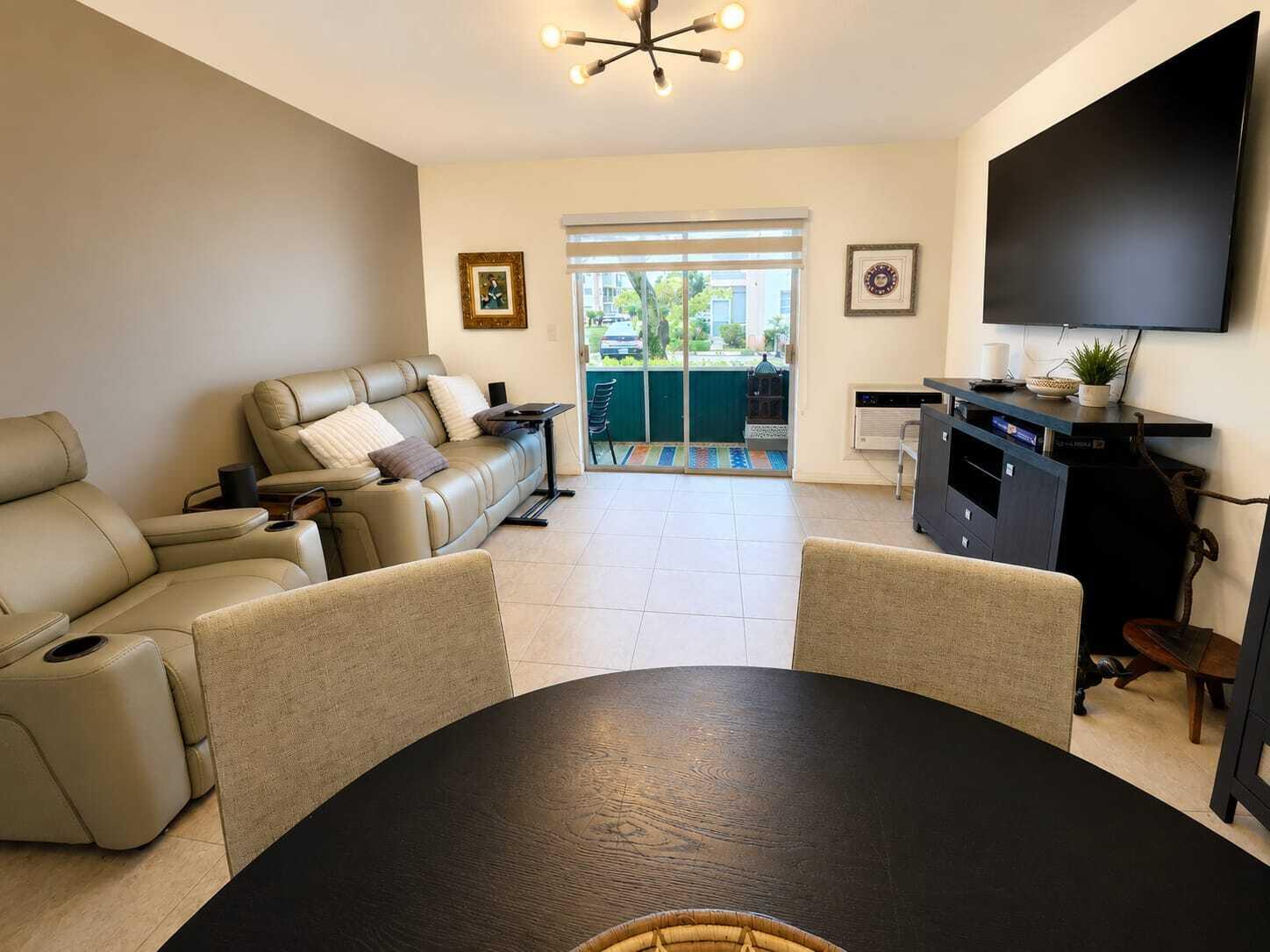 Best unit in the community! Desirable Building 1, first-floor corner unit with assigned parking conveniently located next to the balcony. Beautifully renovated within the last year with a new kitchen, new appliances, remodeled bathroom, new water heater, new electrical outlets, new balcony screens, custom window treatments, new front doors, fresh interior paint, and ample storage throughout. Offered partially furnished and move-in ready. 55+ co-op community with approximately 40 years remaining on the land lease. All information is deemed reliable but should be verified with the association.