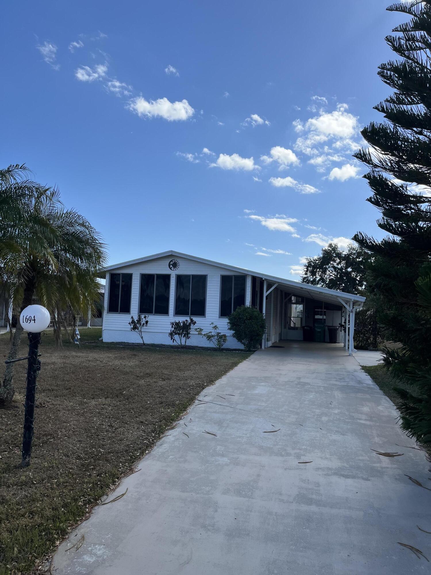 55 plus retirement community offers a list of amenities including swimming pool, barbecue area, picnic tables, bocce ball, shuffleboard, tennis. Our indoor social indoor activities cards, chess, dances and other social events. This home has a comfortable layout with extra rooms for Your comfort, well maintained 2022 new roof In 2020 new AC And countless upgrades. comes fully furnished.