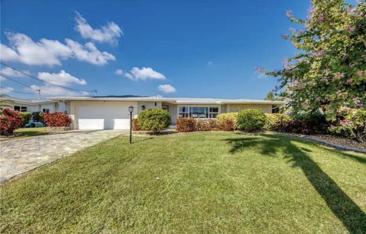 Welcome to this waterfront single-story residence in Cape Coral, offering 1,856 square feet of comfortable living space. This four-bedroom, two-bathroom home provides ample room for various lifestyle needs, whether you're looking for guest accommodations, a home office, or flexible living arrangements. The single-level layout ensures convenient, accessible living without stairs, and the one-car garage offers practical parking and storage solutions. Located in the vibrant Cape Coral community, this waterfront property presents an exceptional opportunity to own a piece of waterside living in Florida.