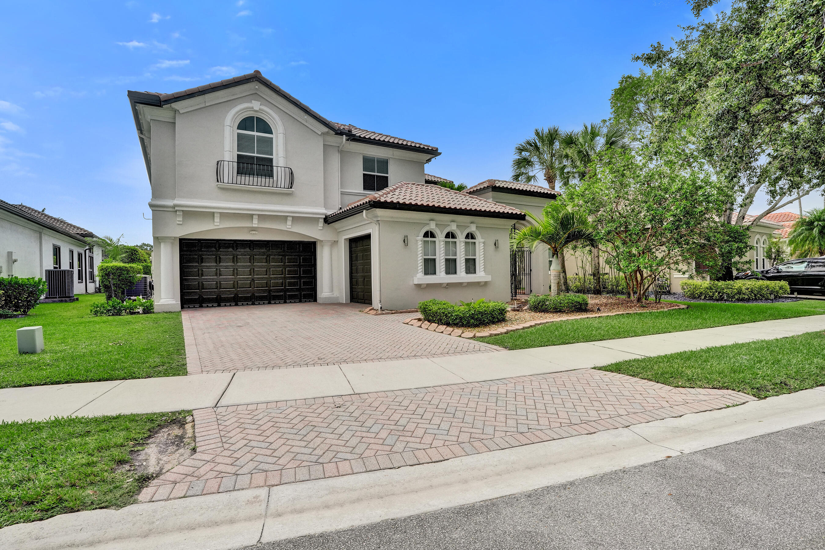 Welcome to The Reserves at Heron Bay! This spacious 2-story waterfront home offers over 3,600 sq. ft. of living space with 5 bedrooms, 4 bathrooms, and a 3-car garage. Bright, open floor plan with high ceilings, tile and laminate wood floors, and a large eat-in kitchen featuring granite countertops, a center island with white cabinets and stainless steel appliances. The oversized primary suite has tray ceilings, a sitting area with a wet bar, two walk-in closets, and a private screened balcony overlooking the water. The primary bathroom includes a large walk-through shower, a soaking tub, and dual vanities. All hurricane impact windows and doors, a 2-zone A/C system, a newer water heater and sprinkler pump, and a fully fenced backyard. A+ school, State of the art amenities. Don't Miss Out!