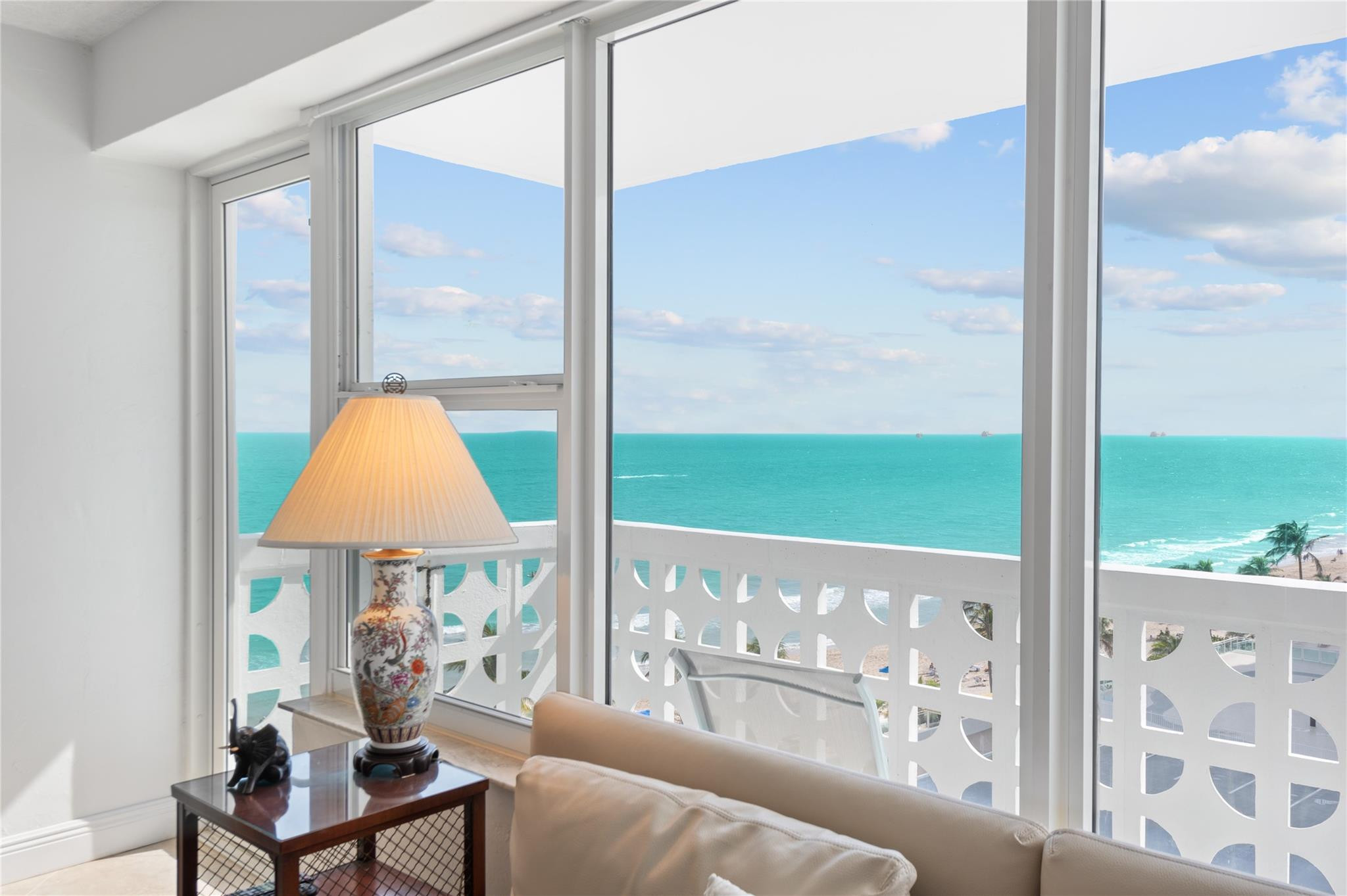A million dollar view for a fraction of the price. This condo boast one of the best views in the area with  ocean views from the living room, bedroom and even the kitchen. You can also enjoy intracoastal waterway views and famous Florida sunsets. Kitchen was recently renovated with open concept, quartz counter tops and stainless steel appliances. Tile floor throughout most the condo with carpet in the bedroom. Bathrooms are original but in good condition. Unit has full impact windows and doors throughout. Building has just added the fire sprinklers and that assessment is paid. Building has large heated pool, club house perfect for events, gym, bike storage, community room, 24 hour security and more! Walking distance to grocery store, doctors, shops, restaurants and places of worship.