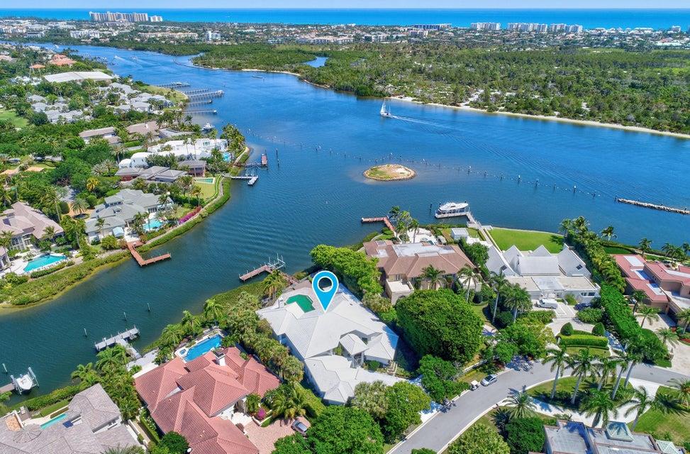 Seldom will an opportunity come along to own one of the premier lots in admirals Cove. An unobstructed view of the intercoastal, 130 feet of water frontage, and a moderate contemporary design. 6500 ft.² of air-conditioned space. Six bedrooms 7 1/2 bathrooms and an extra large pool. Home is ready for remodeling. This is a ''sleeper''. Make it your dream home!!