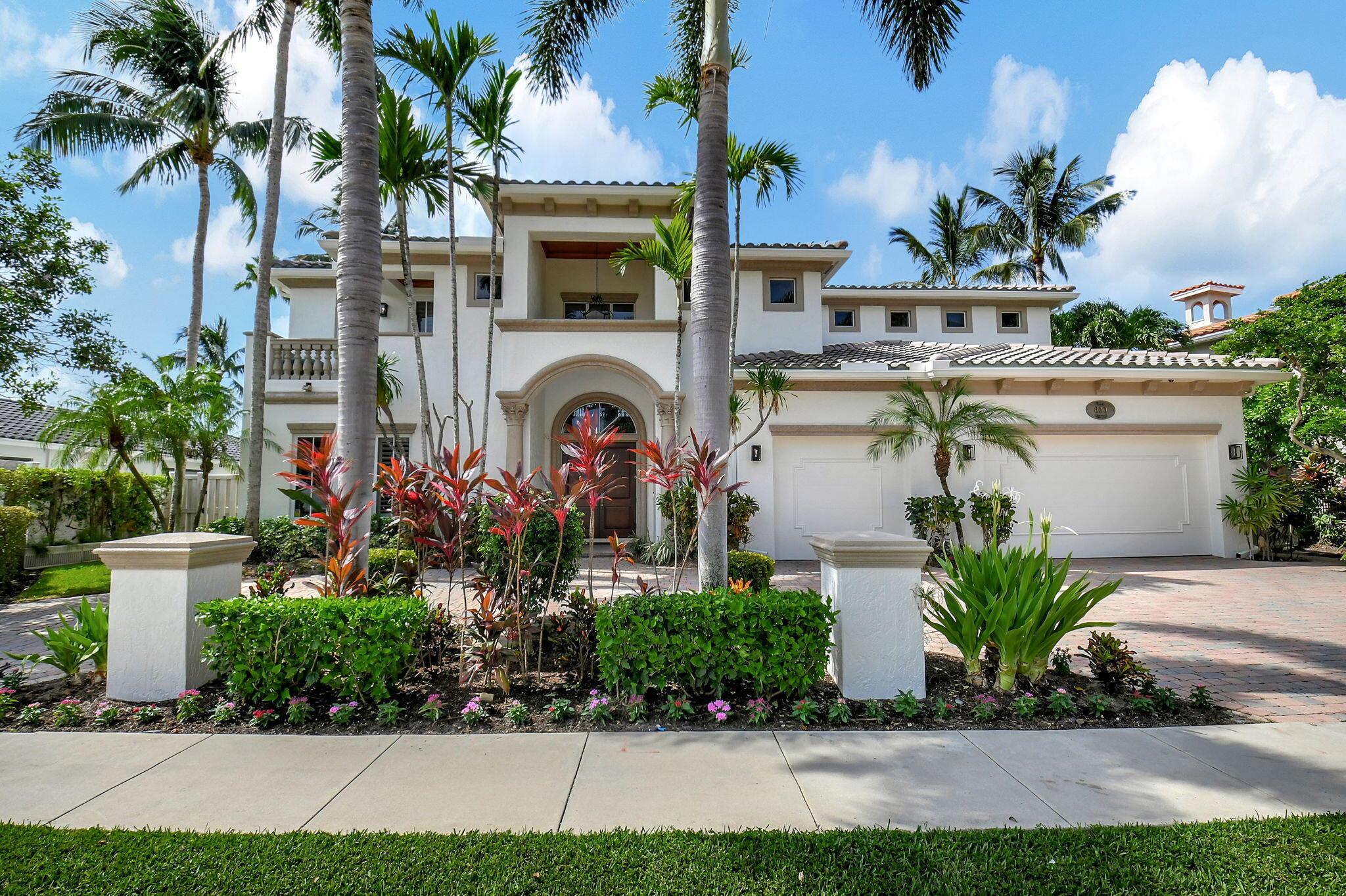 Located in the heart of the yachting enclave Boca Bay Colony, this Mediterranean style gem has been completely refinished, with a new roof, complete home generator, new wolf range, refurbished elevator, and so much more. This home is an entertainer's dream, with high ceilings throughout, wide open kitchen and living area, a completely renovated pool, and a new outdoor kitchen. The primary suite is an expansive room, with two walk-in closets and beautiful waterfront views. All remaining ensuite bedrooms have walk-in closets as well, with ample size for your family/guests. The landscaping of this impressive home has also been redone front and back, adding a privacy fence, grass, and marble countertops with the outdoor kitchen. New paint inside and out, this Old World waterfront estate is the perfect home for you and your family!