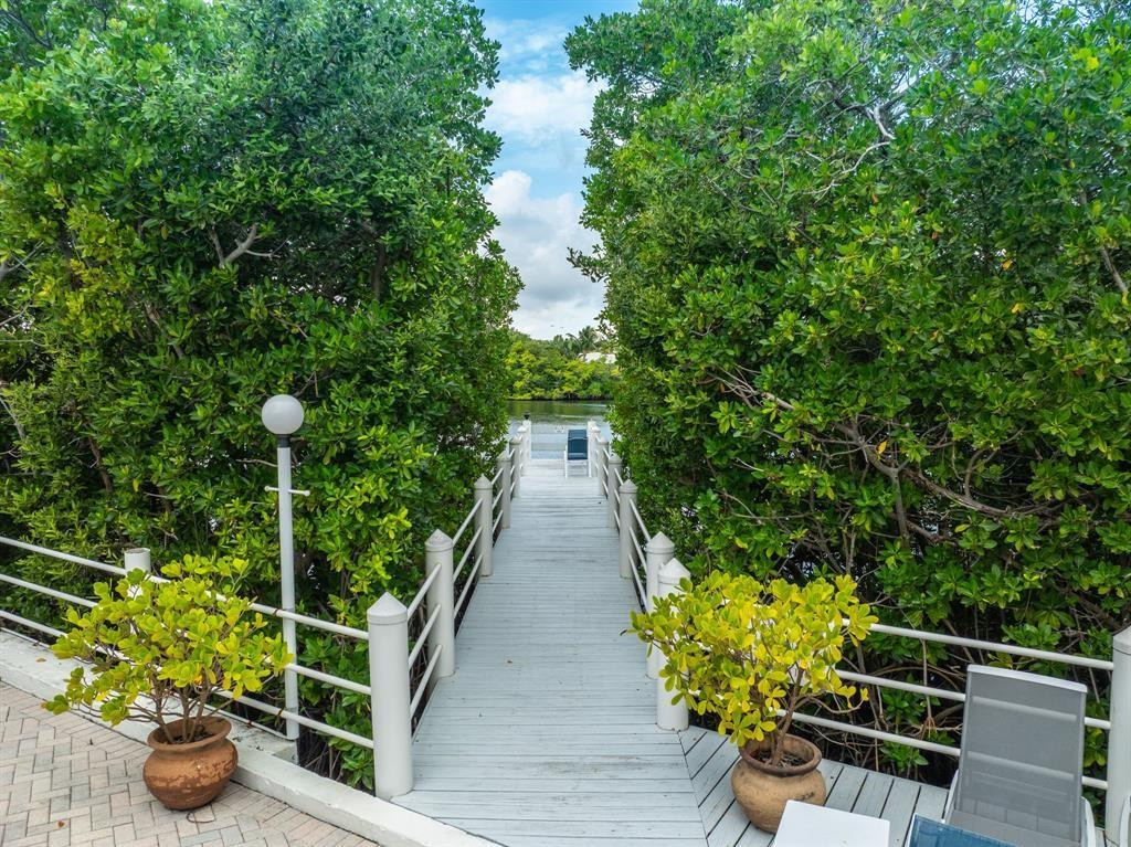 Wake up to the rhythm of the ocean and end your days with warm coastal breezes in this beautifully renovated 2-bedroom, 2.5-bath condo. Steps across A1A, the beach becomes an extension of your lifestyle, morning walks, sunset strolls, and endless seaside moments. Inside, two private suites offer walk-in closets and elegant baths with frameless glass showers. The open kitchen shines with granite countertops, tile backsplash, and stainless steel appliances, flowing seamlessly into bright living spaces with engineered wood flooring and crown molding. Enjoy tranquil mornings or breezy evenings on the south-facing balcony. Hurricane-impact windows, in-unit washer/dryer, storage room. Maintenance includes cable, water, and trash.