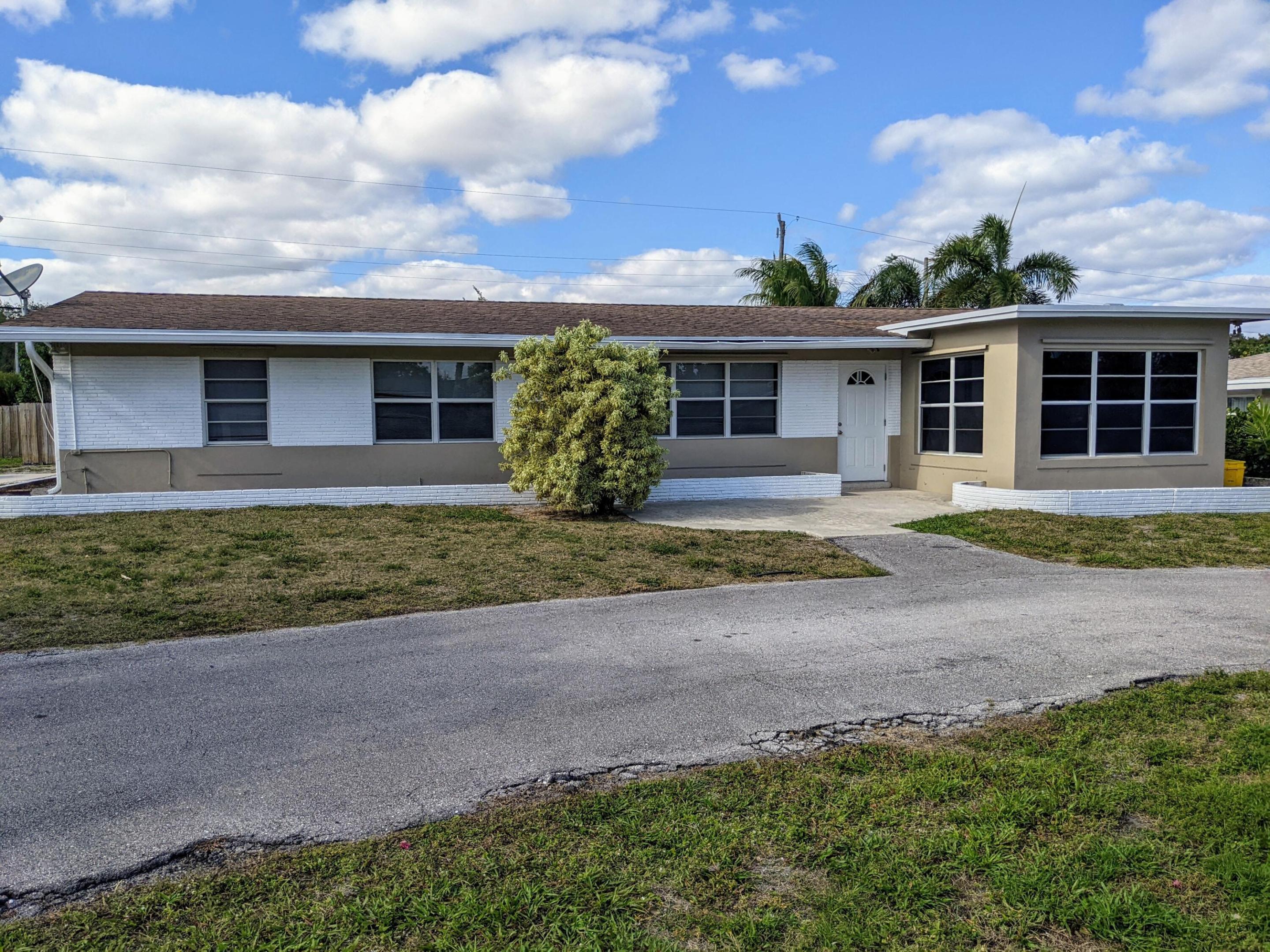 Florida style pool home with updated kitchen and bathrooms. This home is a 4/2 with an attached 1/1 mother in law suite. Covered and screened patio and pool to enjoy life outdoors. Large laundry room and saltillo tile flooring throughout. Fenced in yard corner lot with plenty of parking. Close to dining, shops, and major highways. 8533 sqft approximately .2 acre corner lot on a cul de sac. Boca Raton zoning plat before 1966 with prior platted zoning setback. Great rental property over $5300 per month and walls can be moved to suit your needs.