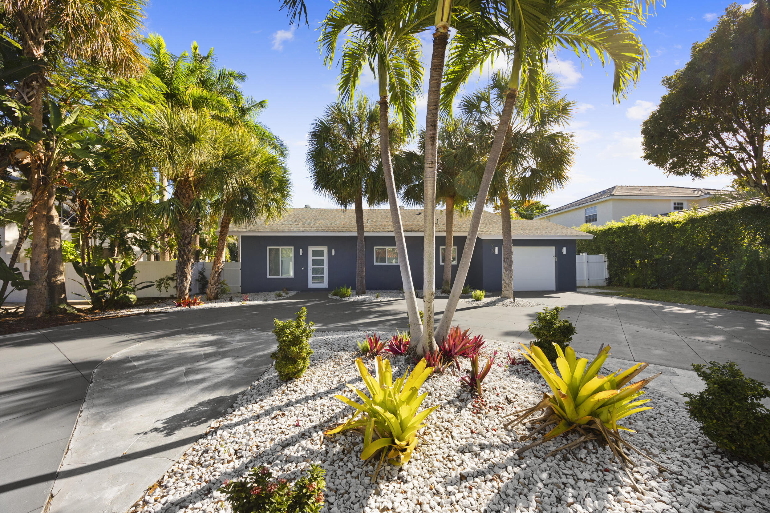 Great investment property tenant in place. Beautifully renovated 3BR/2BA pool home, move in ready, featuring a spacious split floor plan and a designer kitchen with an oversized island, stainless steel appliances, and custom storage. Expansive sliding doors fully retract to create seamless indoor outdoor living. Both bathrooms showcase luxe Toto Neorest toilets, complemented by impact windows and an automated pool screen. Enjoy a lush, private backyard with a resort style pool and an oversized circular driveway. No HOA. Prime East Boca location just minutes from Mizner Park, FAU, beaches, and fine dining.