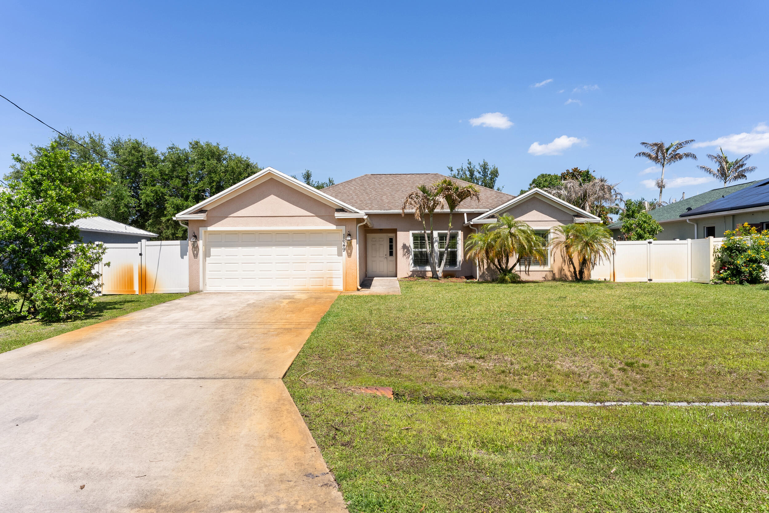 Step into this charming 3-bedroom, 2-bath, 2-car garage home, built in 2016 and ideally located with quick access to both I95 and the Turnpike. This wellmaintained property features a newly installed fence and a recently updated A/C system (late 2025), offering peace of mind and added value. Beautiful woodlook flooring flows throughout the home, making upkeep effortless and giving the space a warm, modern feel. Come see it for yourself and fall in love today.
