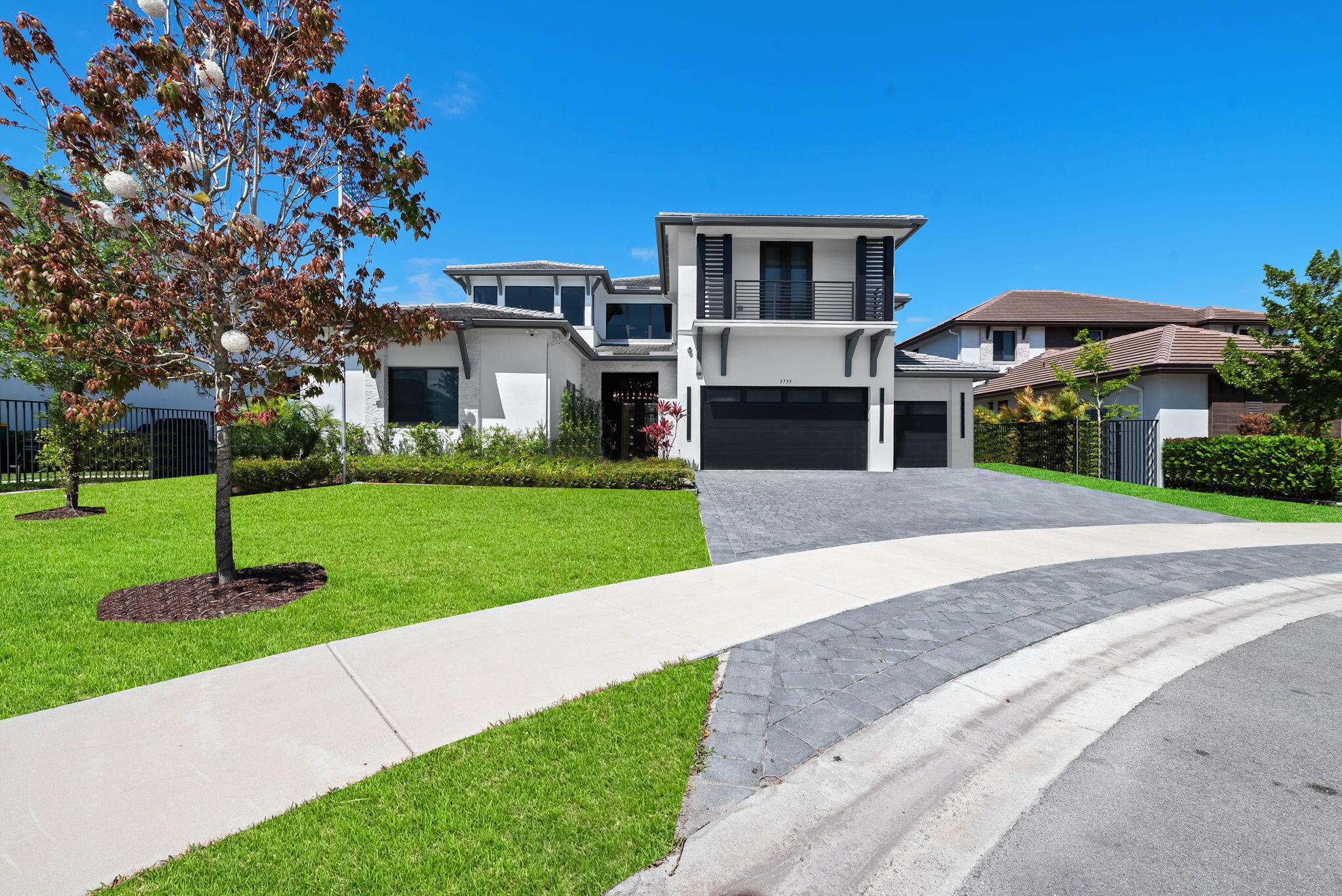 EXPERIENCE MODERN LUXURY IN THIS STUNNING NEW CONSTRUCTION WATERFRONT ESTATE LOCATED ON A QUIET CUL-DE-SAC IN A PRESTIGIOUS COOPER CITY GATED COMMUNITY. THIS EXPANSIVE 6BR/5.5BA RESIDENCE FEATURES SOARING 11' CEILINGS AND A BRIGHT OPEN-CONCEPT LAYOUT. THE DESIGNER KITCHEN IS A CHEF'S MASTERPIECE, EQUIPPED WITH HIGH-END APPLIANCES, EUROPEAN-STYLE CABINETRY, AND SLEEK QUARTZ COUNTERTOPS. UNIQUE TO THIS FLOOR PLAN IS A DEDICATED MOVIE ROOM, PERFECT FOR PREMIER AT-HOME ENTERTAINMENT. THE HOME IS FULLY INTEGRATED WITH A SMART SYSTEM INCLUDING SPEAKERS THROUGHOUT AND AN ADVANCED CAMERA SECURITY NETWORK. FOR THE ULTIMATE WELLNESS EXPERIENCE, ENJOY A PRIVATE COLD PLUNGE LOCATED ON THE BALCONY OVERLOOKING THE WATER. ADDITIONAL HIGHLIGHTS INCLUDE A SPA-INSPIRED PRIMARY SUITE, A PRIVATE IN-LAW SUITE WITH A SEPARATE ENTRANCE, CUSTOM BUILT-INS, HURRICANE IMPACT GLASS, AND A 3-CAR GARAGE. WITH OVER 7,100 TOTAL SQ FT OF REFINED LIVING SPACE, THIS RARE RENTAL OPPORTUNITY PERFECTLY COMBINES TECHNOLOGY, PRIVACY, AND WATERFRONT ELEGANCE.