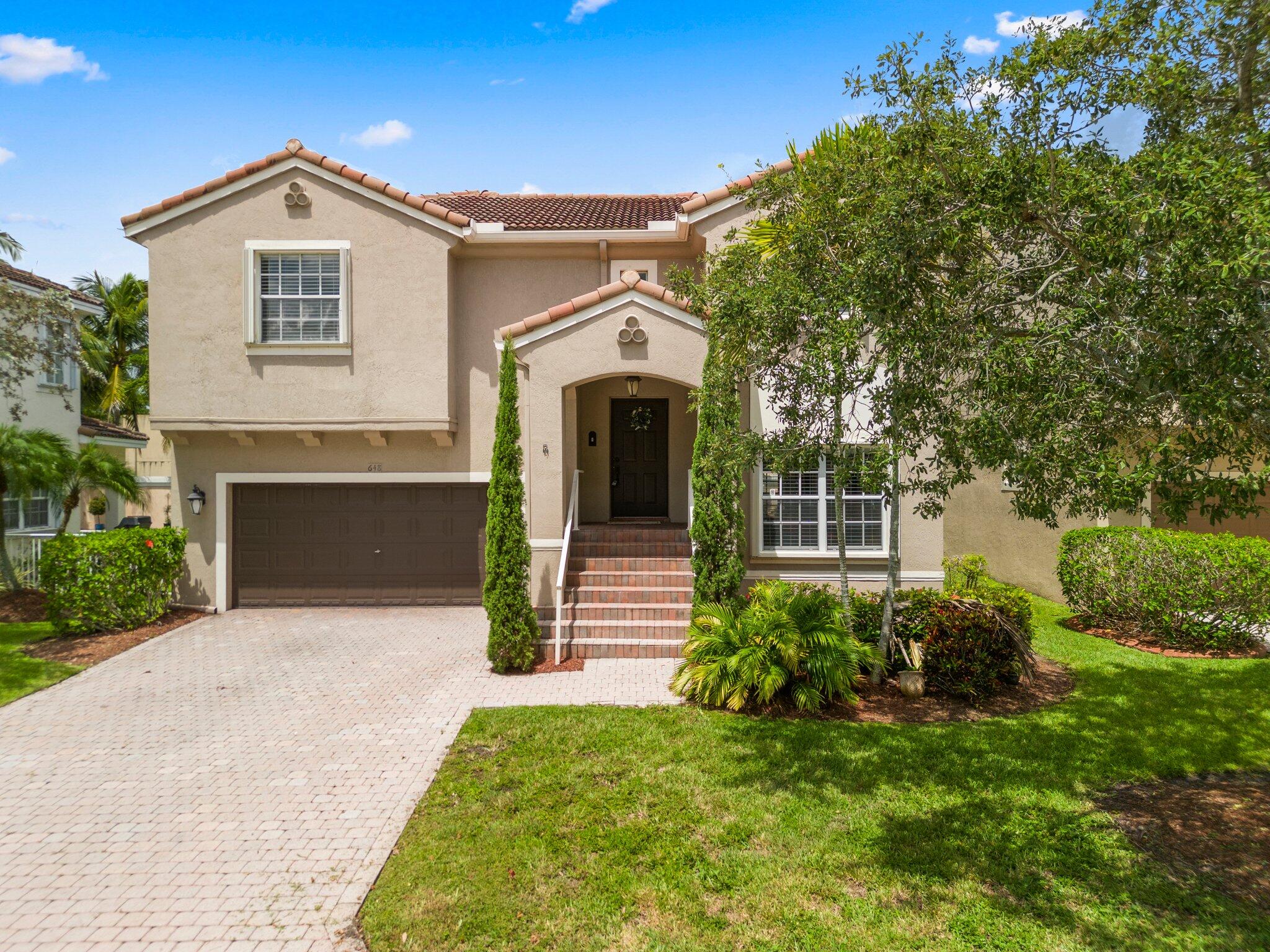 Welcome to Vizcaya at Lake Coral Springs, a gated, waterfront community offering comfort, style, and convenience. This beautiful 2-story home features 3 bedrooms, 2.1 bathrooms, and 2,160 sqft of living space, perfectly designed for modern living.  Step inside to a warm and inviting interior showcasing dark wood kitchen cabinets, a lovely backsplash, stainless steel appliances, LED under-cabinet lighting, tall baseboards, crown molding, and even a vault/safe for added peace of mind. Enjoy year-round comfort with AC (2022), water heater (2023), air duct cleaning, and UV light installation.   The home offers a closed patio with a living area, an open backyard with room for a pool, and a water view from the balcony overlooking the canal. Accordion shutters provide added storm protection, and the 2-car attached garage plus driveway offers extra parking space.  Located next to Church by the Glades with fast, easy access to the Sawgrass Expressway, this community is both peaceful and convenient. The HOA includes lawn service, cable, alarm, community pool, gym, and tennis courts, making this home an exceptional value.
