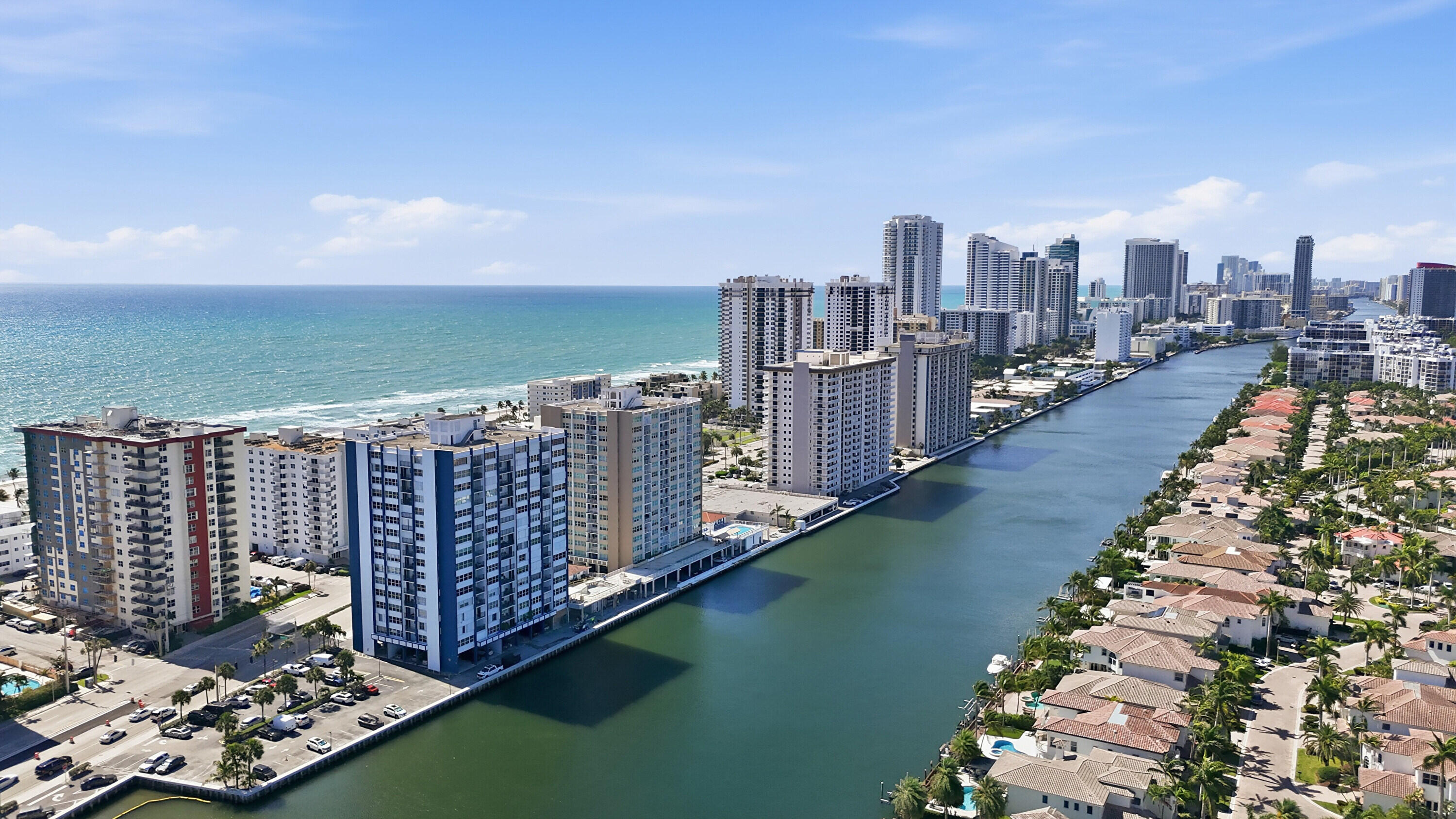 WELCOME TO YOUR WATERFRONT OPPORTUNITY IN HOLLYWOOD BEACH. This well maintained 1-bedroom, 1.5-bath condo offers exceptional value, proving that quality stands the test of time. Enjoy peace of mind with impact windows and a sliding glass door, enhancing both safety and energy efficiency while framing stunning Intracoastal views from every angle. Natural light fills the spacious, open-concept living/dining area, creating a bright atmosphere. Step onto your private balcony and take in the serene water views as boats pass by—an everyday luxury that never gets old. The unit is in remarkably well-kept condition, offering a perfect canvas for a buyer to personalize or simply move in and enjoy. Amenities include heated pool, gym, sauna, deeded covered parking and ample guest parking space. Located just minutes from the renowned Hollywood Beach Broadwalk, dining, shopping & entertainment, this is your chance to own a prime waterfront location at an attractive price point. Whether you're looking for a primary residence, vacation retreat or investment, this unit delivers on lifestyle and a long-term potential. The building is undergoing upgrades to satisfy the 50 year certification that will continue to elevate the property's value making this not just a home but a smart investment opportunity.