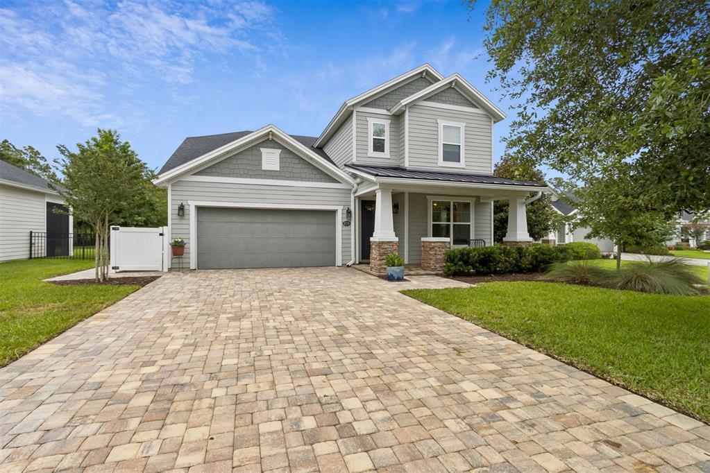Located in the sought-after Amelia Walk community, this unique Davenport floor plan has been meticulously kept offering 4 bedrooms, 3.5 bathrooms, plus a dedicated office/bonus space. Engineered wood flooring flows throughout, complemented by crown molding and high baseboards for a clean, elevated look. Designed for both comfort and entertaining, the home features a heated salt pool, creating a private outdoor retreat. Additional highlights include an EV charger and thoughtful upgrades throughout. Amelia Walk residents enjoy resort-style amenities including tennis courts, a clubhouse, fitness center, zero-entry pool, playground, soccer field, and scenic walking paths. Schedule your tour today! Select furnishings negotiable. CDD Fee $3838/annual & The maintenance fee $45/annual.