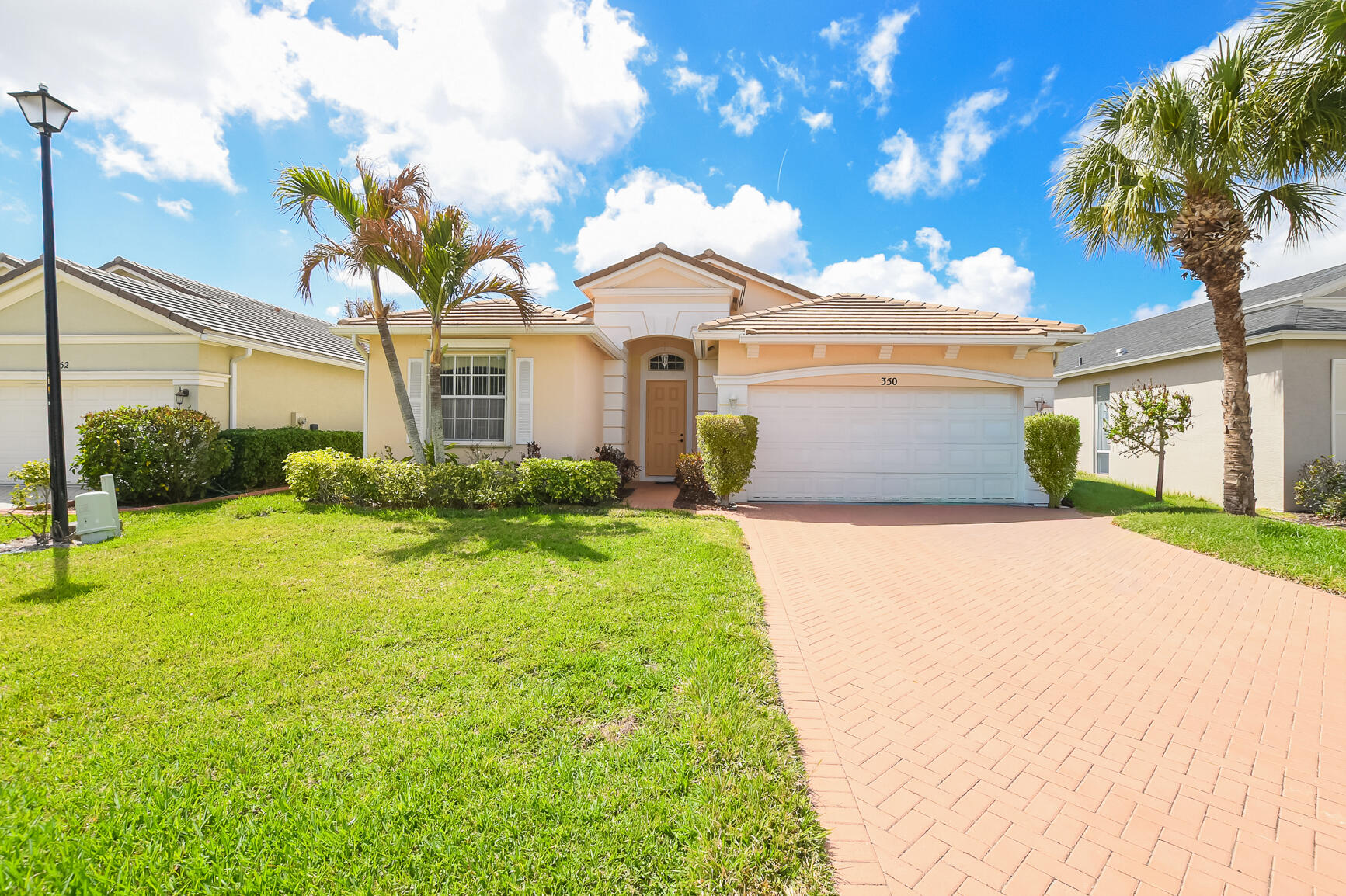Beautiful home in Lake Forest at St Lucie West with lovely Lake View. This great location is close to schools, restaurants, doctors, hospital, shopping, golf & even the home of the NY Mets spring training. Features CBS Construction, Flat Tile Roof, Paver driveway & covered entrance. Offers 3 Bedrooms, 2 Baths, Den / Office with space for a closet & 2 Car Garage. Details include Tile & bamboo flooring, volume ceilings & move in condition. Eat in Kitchen, Stainless steel appliances & sliding glass doors with natural lighting. Accordion & Panel Shutters, screen enclosed Lanai & tranquil Lake Setting. HOA includes Gated security, pool, clubhouse (recreation center), sidewalks, internet, cable, lawn care, common areas, manager, playground & picnic area.