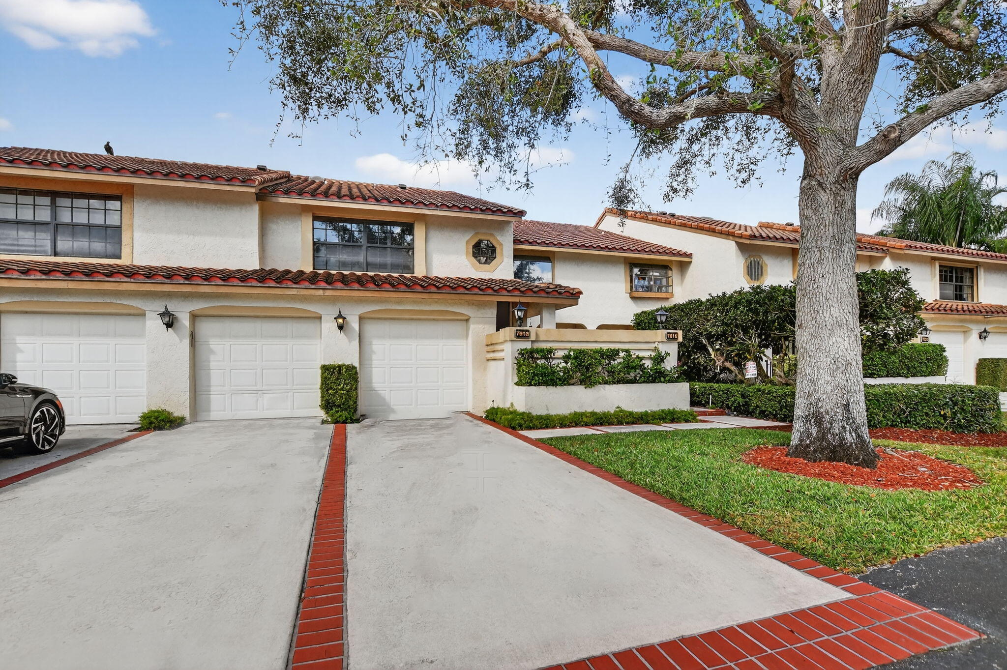 Spacious 3 bedroom, 2 bath condo with one-car garage in desirable La Mirada at Boca Pointe. This light and bright residence features two separate stairways for convenient access and added privacy. The interior has been updated with brand new vinyl flooring, refreshed bathroom cabinetry, new lighting fixtures, and numerous additional improvements. Enjoy tranquil golf course views from the main living areas and private balcony. The kitchen offers updated cabinetry, countertops, and appliances, along with ample storage and workspace. A desirable split bedroom floor plan provides privacy for the primary suite, while the additional bedrooms are generously sized and versatile. Ideally located close to the community pool, this home offers comfort, style, and the best of Boca Pointe.