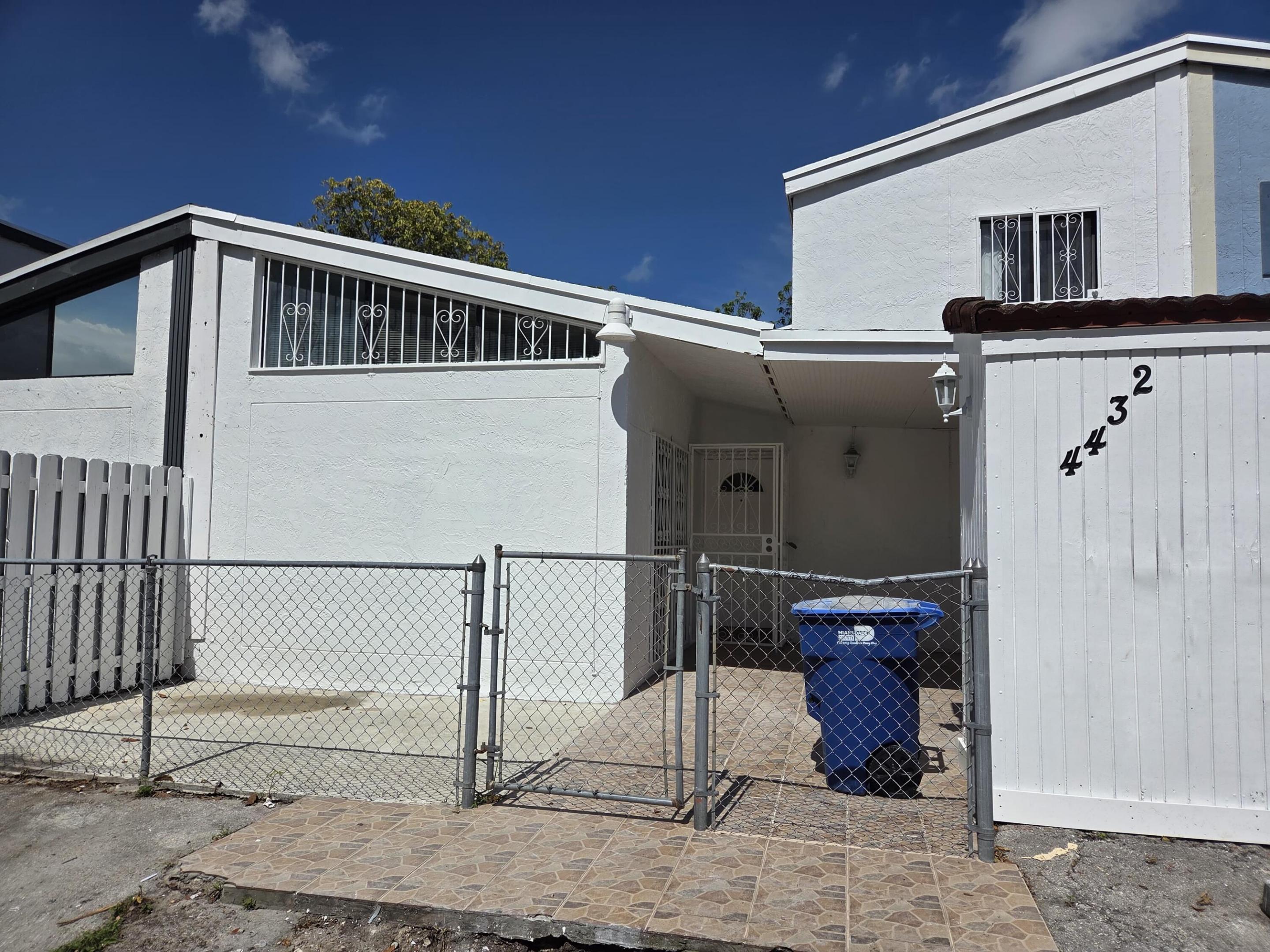 Beautiful 4-bedroom, 2-bathroom home in a convenient location near the Palmetto Expressway. The functional floor plan offers 2 bedrooms and 1 full bathroom on the first floor, with an additional 2 bedrooms and 1 full bathroom upstairs, providing flexibility for families or guests.  The property features a spacious covered front patio, perfect for relaxing or entertaining, as well as parking space for up to 3 vehicles. Conveniently located close to major highways, shopping, schools, dining, and everyday conveniences.