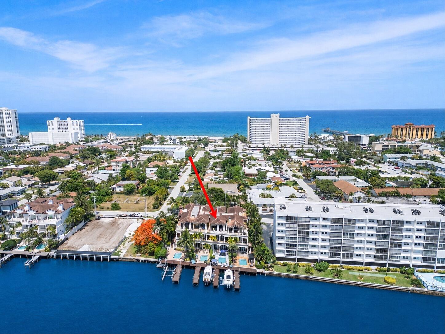A TRUE " FISHERMAN'S PARADISE!" THIS SUPER UPDATED & COZY TURNKEY SPACIOUS 3,690 SQ FT 3 STORY TOWNHOME IS MOVE-IN READY. EQUIPPED WITH PRACTICALITY & CONVENIENCE, EVERY ROOM OF THIS MAGNIFICENT INTRACOASTAL CONDO HAS BEEN CAREFULLY CONSTRUCTED. 1ST FLOOR OPEN FLOOR PLAN WITH INSPIRATIONAL INTRACOASTAL VIEW OF BACKYARD MARBLE DECK & POOL, 30 FOOT DOCK, 14,000 POUND BOATLIFT; COMPLETE WITH GRILL, FISHERMAN TACKLE & FISHING ROD STORAGE AND OTHER WONDERFUL OUTDOOR AMENITIES. ENJOY THE CONVENIENCE OF A LARGE 11 FOOT MARBLE KITCHEN ISLAND SURROUNDED BY A WALK- IN PANTRY, LOADS OF EFFICIENT LIGHTED & CUSTOM KITCHEN CABINETS, GAS STOVE, AND OTHER SUPERIOR MODERN APPLIANCES; ( 48 INCH SUB - ZERO CUSTOM REFRIGERATOR, WOLF CONVECTION OVEN, WOLF STEAM OVEN, WOLF GAS COOKTOP; MAKING HOSTING FUN & EASY
