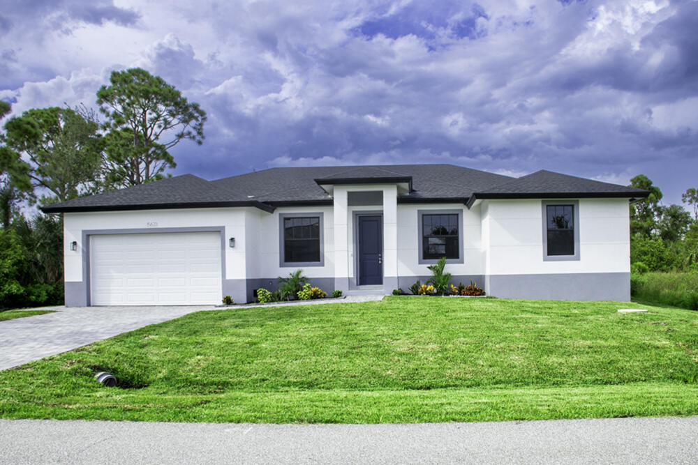 4BR/2BA Single Family Home in Port Charlotte This newly built gem blends modern design and functionality, offering spacious, sun-filled living areas. The kitchen features sleek white countertops, an island, and modern appliances—perfect for any home chef. Enjoy a peaceful, lush yard ideal for relaxation. Located just minutes from Gasparilla Road, this home offers the perfect balance of tranquility and convenience. Virtual staging for illustration purposes.