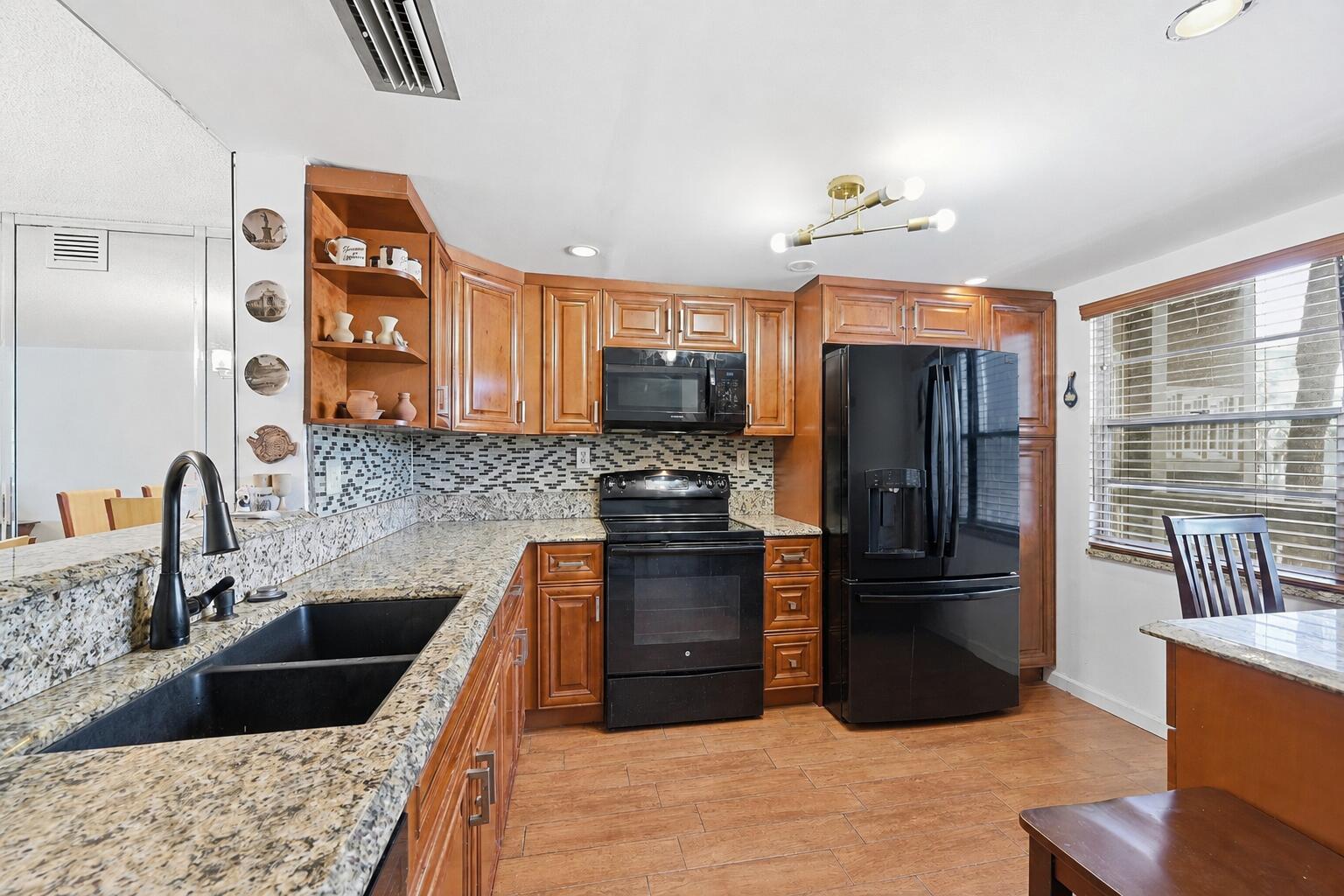 Updated residence located in one of South Florida's premier 55+ golf and tennis lifestyle communities. A/C 2 years old. Furniture negotiable. Includes storage locker, basic cable, internet, and 1 small pet allowed. Enjoy resort-style living with new pickleball and tennis courts, an 18-hole executive golf course, fitness center with updated equipment, art studios including glass making, stained glass, pottery and sculpture, plus a 1,000-seat theater featuring live entertainment and movies. The community also offers a restaurant and bistro serving breakfast, lunch, and dinner, bus service throughout the community and to local shopping, doctor on site, scenic 2.5-mile walking path, and laundry facilities on each floor. Active social calendar with daily activities and events.