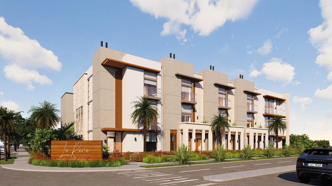 Expected delivery Q1 of 2026!  Welcome to Le Rêve, a luxurious collection of townhomes nestled in the heart of downtown Boca Raton, offering coastal-inspired design, sophisticated features, and unparalleled attention to detail. Inside, you'll find expansive living spaces across four bedrooms and four and a half bathrooms, all accessible by private elevator. Every detail has been carefully considered, from Italian custom cabinetry and quartz countertops to porcelain tile flooring and top-of-the-line Bertazzoni, XO, and Sub-Zero appliances. Awash with natural light, the interiors benefit from floor-to-ceiling impact windows and folding doors that seamlessly blend interior and exterior living. with private pool, integrated landscaping, living green wall, and two folding glass door systems.  A two-story private guesthouse with separate entrance is found to the rear of the elevated courtyard. Designed for ultimate flexibility, the guesthouse includes a kitchenette with full bar on the first floor and a versatile bonus space on the second floor   ideal for entertaining or hosting overnight guests.  With gated access and two garages offering two parking spaces each, car connoisseurs can easily accommodate up to four vehicles. Combined with a state-of-the-art security system and over-engineered structural elements designed to withstand severe weather and hurricanes, every detail prioritizes modern safety and peace of mind.  Located in the golden triangle of downtown Boca Raton, Le Rêve places you at the center of one of South Florida's most sought-after destinations. Just outside your door, you'll find exclusive shops, fine dining, cultural attractions, pristine beaches, world-class golf courses, and serene nature reserves. With easy access to the Brightline High Speed Rail Station, you'll be effortlessly connected to Fort Lauderdale, Miami, and beyond. Boca Raton also offers top-rated schools, luxury country clubs, and a thriving arts and culture scene, making it the perfect place to live, work, and play.  Currently under development, Le Rêve is offering limited pre-sale opportunities. With their combination of contemporary design, thoughtful amenities, and an unbeatable location, these townhomes are a rare find in today's market. Don't miss your chance to experience the dream of Le Rêve schedule your private tour today.