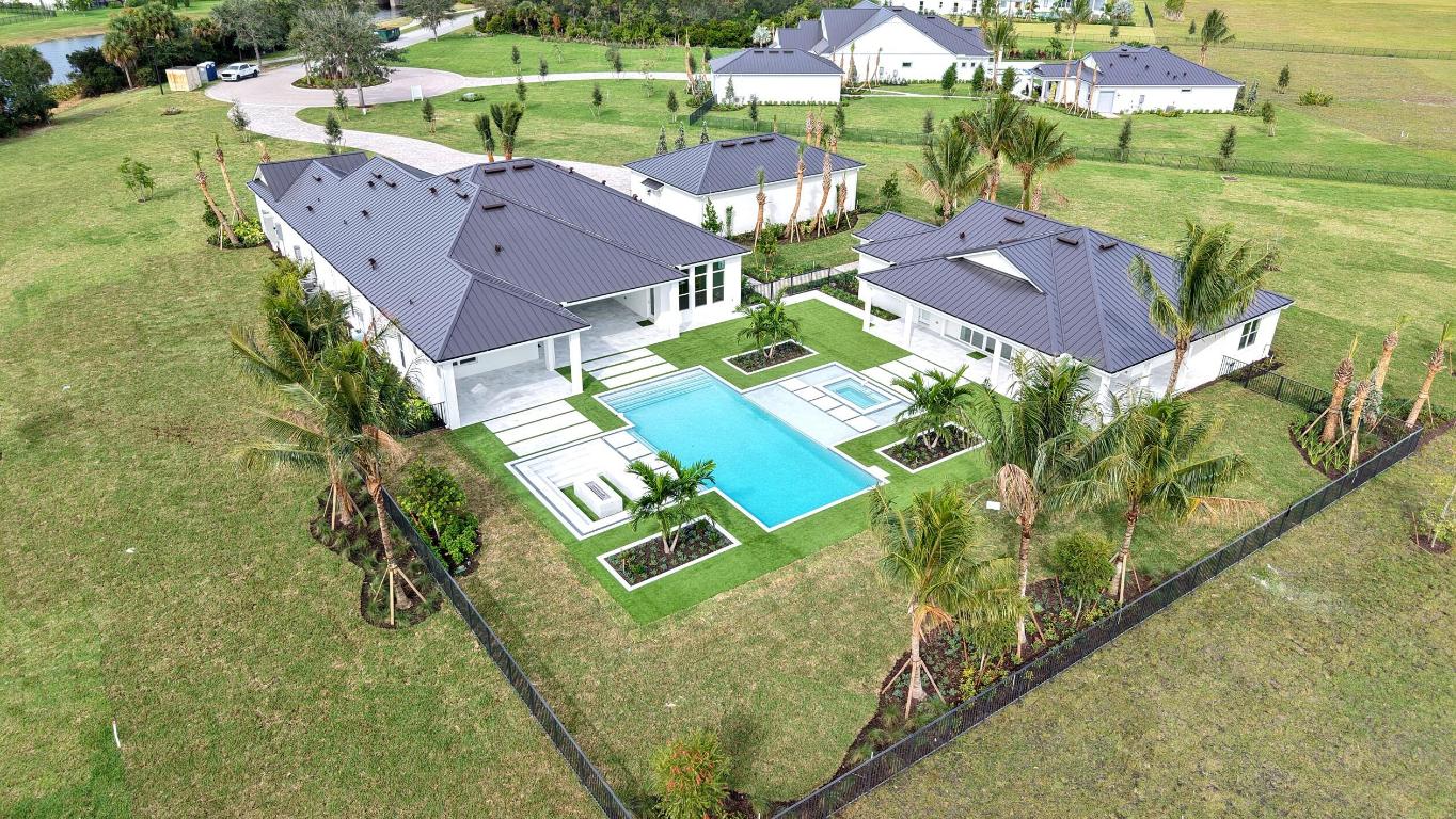 NEW CONSTRUCTION:  Welcome to luxury on a new level in The Retreat section of Bridgewater.  This is a unique opportunity to live on FIVE acres of land backing to a lush preserve. Sprawling main house has 4 bedrooms each with ensuite bathrooms and walk in closets.  Home also boasts an additional powder room, home theater with wet bar and Den space.  The kitchen area is sure to delight with a wine cellar and separate prep kitchen area. Impressive pocketing sliders open to covered lanai overlooking the pool area. Guest house features a Gracious Bedroom and Bath, Cabana bath, Den, Built in Kitchen, laundry room & handy storage area.   Zero Corner Slider doors open to the wrap around porch. Separate 4 car garage building provides ample storage. Opulent Finishes Added Throughout.