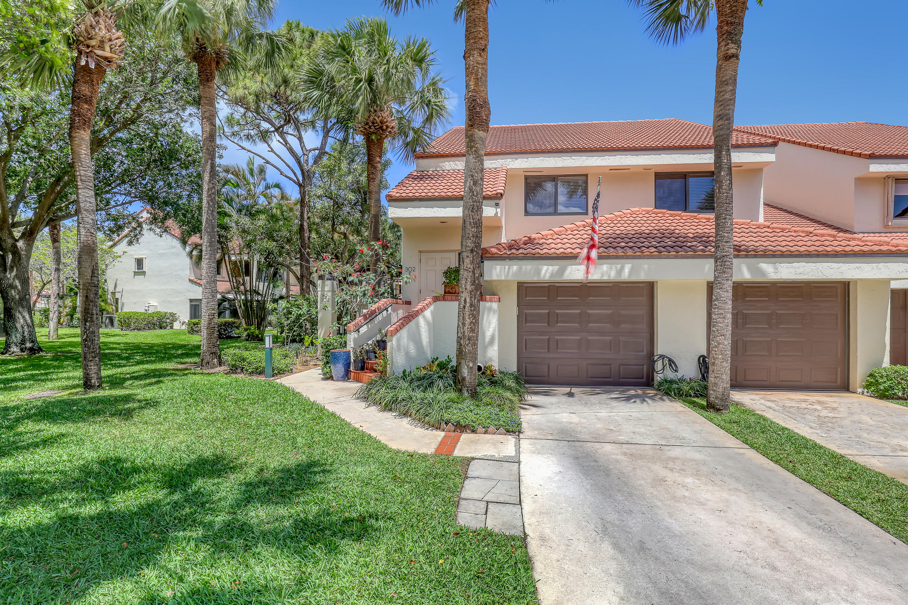 Experience coastal living in this beautifully updated 3-bedroom, 2-bathroom condo, ideally located less than a mile from Juno Beach and backing up to the protected preserve area of Juno Dunes for utmost privacy. Featuring vaulted ceilings and serene lake views, this home offers a bright, open, and inviting living space. Enjoy convenient access to top-tier dining, boutique shopping, and the laid-back charm of one of South Florida's most desirable beach side communities. Upgrades include impact windows throughout, AC duct work updated and full replacement of original polybutylene piping, providing long-term value and peace of mind.  HOA includes: Hurricane, flood and exterior insurance, cable and high-speed internet, water, sewer, quarterly pest control, biannual power washing of driveway and walkways, landscaping and pool maintenance (pool was completely redone in 2026). No special assessments. TVs, bar stools, 2 swivel chairs, second refrigerator in garage also included in sale price- the rest of furniture is negotiable.