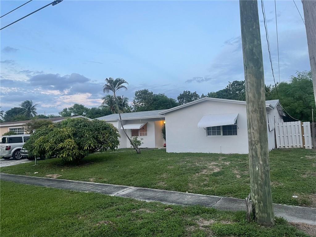 Great 4 Bedroom/2 Bathroom Home in the Heart of Lauderdale Lakes. Home Features LaminateFloors Throughout, Nice Size Bedrooms with Good Closet Space and 1 Car Garage. Large Kitchen and Florida Room/Additional room Perfect for Entertaining Family and Friends. Backyard Features Pool and is Waterfront to the Canal. Location Offers Easy Access to All Major Roadways, Shopping, Dining, Public Parks, Public Transportation and Much More! House is Ready for It's New Owners.Driving Directions,Driving Directions: N State Road 7 to NW 41 Street. West on NW 41 Street to NW 35 Avenue. South to NW 35 Avenue to Property