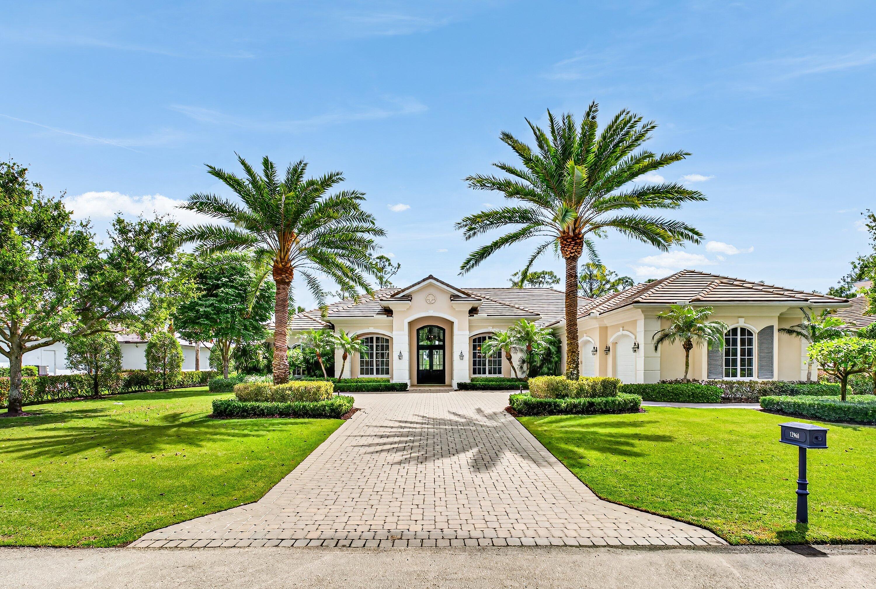 This recently built and meticulously maintained custom home sits on nearly two thirds of an acre on a quiet cul-de-sac in prestigious Old Marsh Golf Club. Water, golf course and marsh views abound in this light and airy home filled with window walls of glass. As you walk through each room, the attention to detail becomes obvious - wainscoting, crown molding, marble and wood floors, custom ceilings, window treatments, built ins & light fixtures. The gourmet island kitchen features white contemporary cabinetry, quartz countertops and Wolf and other top of the line appliances. The owners suite has two complete baths and two walk in closets with built in drawers and shelving. Each guest room has its own ensuite bath. Outside, the covered lanai houses a full summer kitchen and tranquil views.   And then, of course there is Old Marsh itself, an exclusive, gated enclave of custom estate homes on half-acre or larger homesites, surrounded by protected nature preserves. The acclaimed Pete Dye-designed championship golf course offers no tee times, a nationally recognized caddie program, and ranks among the best in the country. Just minutes from beaches, the airport, excellent public and private schools and fine dining, shopping, and cultural attractions, this impeccably decorated and maintained home presents a rare move in ready opportunity in one of the Palm Beach's most sought-after private communities.