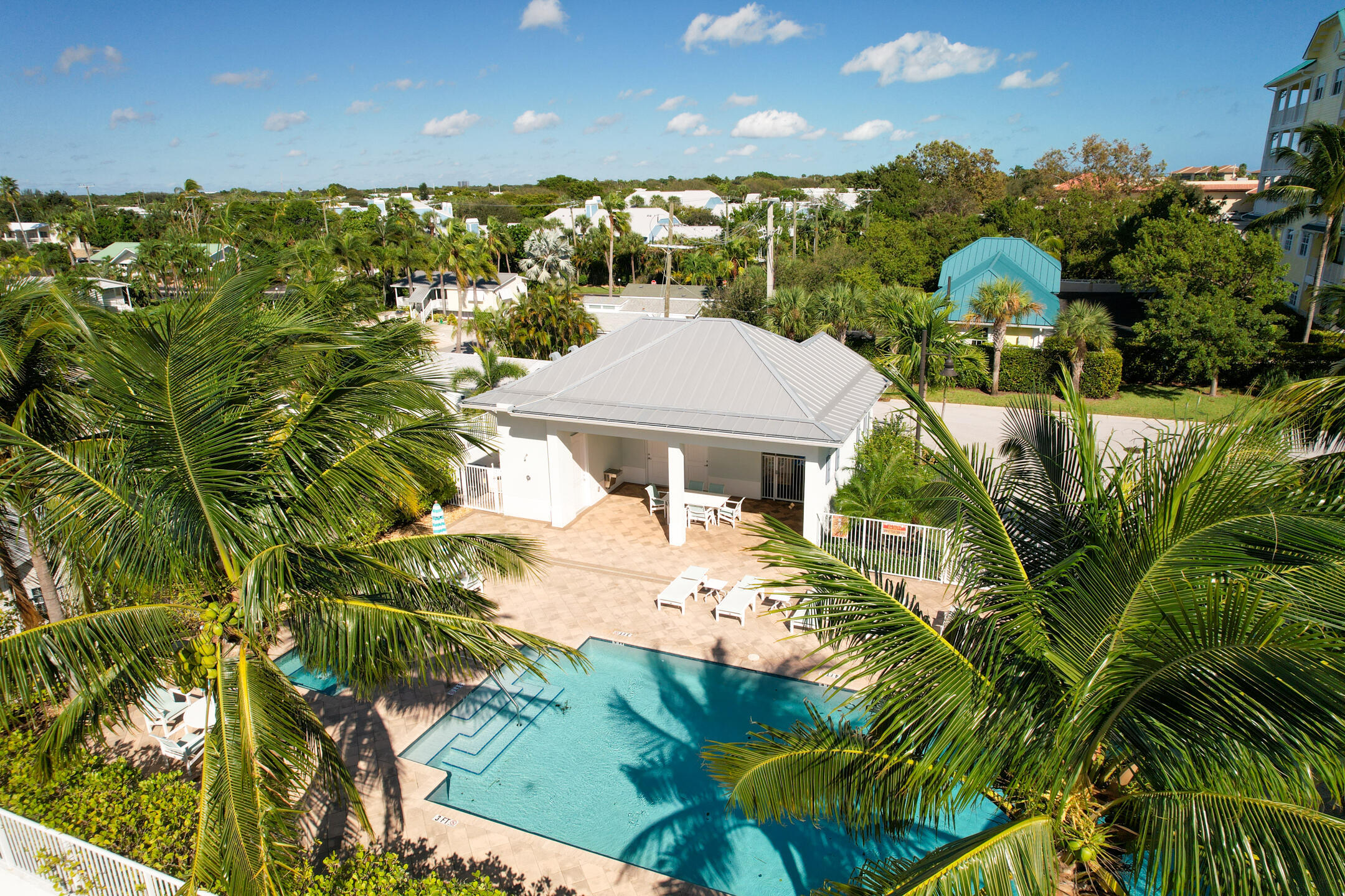Just steps from the ocean and Juno Beach Pier, this modern Key West style townhome built in 2017 boasts high ceilings, 3 bedrooms, 2.5 baths, 2 car garage, metal roof, impact windows and doors, plantation shutters, recent designer upgrades and much more. Available for seasonal rent from Nov 2026 - April 2027.  The developer installed special soundproofing material within the walls to provide the comfort of a single family home. Ideally positioned within this charming community of Ocean Breeze with a total of only 24 homes and community pool - enjoy the lifestyle that only Juno Beach & Jupiter can offer!