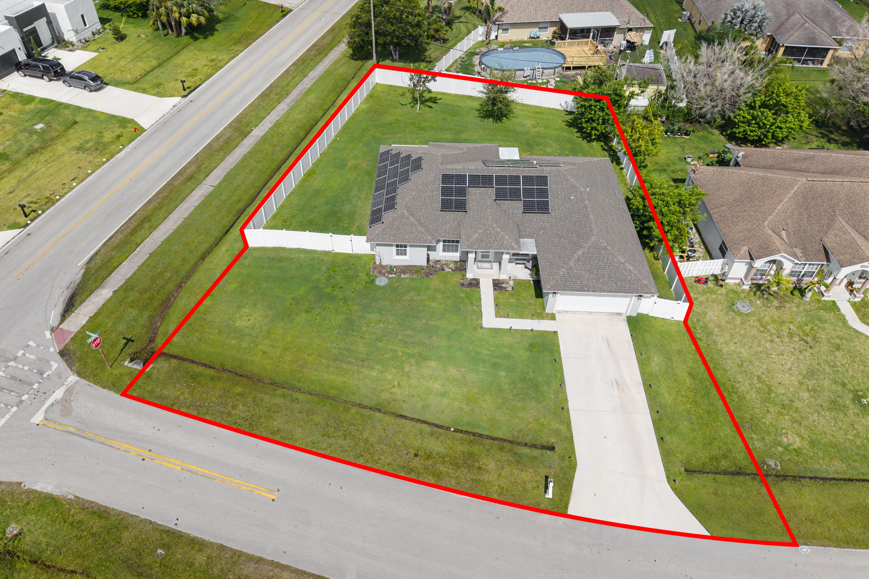 Welcome to this spacious, single-story residence situated on an oversized corner lot. This home features a split floor plan with 4 bedrooms and 3 full bathrooms, including a cabana bath ready for a future swimming pool. The fourth bedroom includes its own private bathroom and a complete closet system. The modern kitchen is equipped with quartz countertops, a hood stove, and stainless-steel appliances. Additional highlights include laminate flooring, stylish barn doors, impact windows, and a tiled master bathroom with a freestanding soaking tub. The property features numerous upgrades throughout including solar panels. We invite you to come and see it for yourself. Professional photos coming soon.