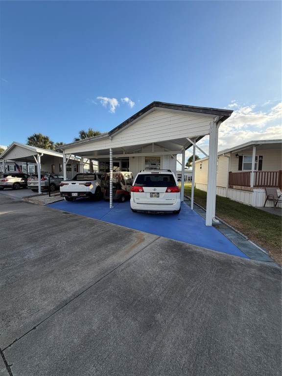 Welcome to resort-style 55+ living at Lake Okeechobee! This charming Palm Harbor park model with an addition offers 1 bed 1 bath, featuring  Partially glass/Vinyl enclosed Florida room that adds extra comfort. The home comes completely furnished located on a double street and has a double carport for parking. Ancient Oaks is an active, resort style community offering a heated pool, pickleball courts, a huge clubhouse, and a full calendar of events. Enjoy the on-site marina with a boat ramp and fish cleaning station. Pets are welcome! Comfort, convenience, and an unbeatable lifestyle in one of  Okeechobee's most sought after communities.