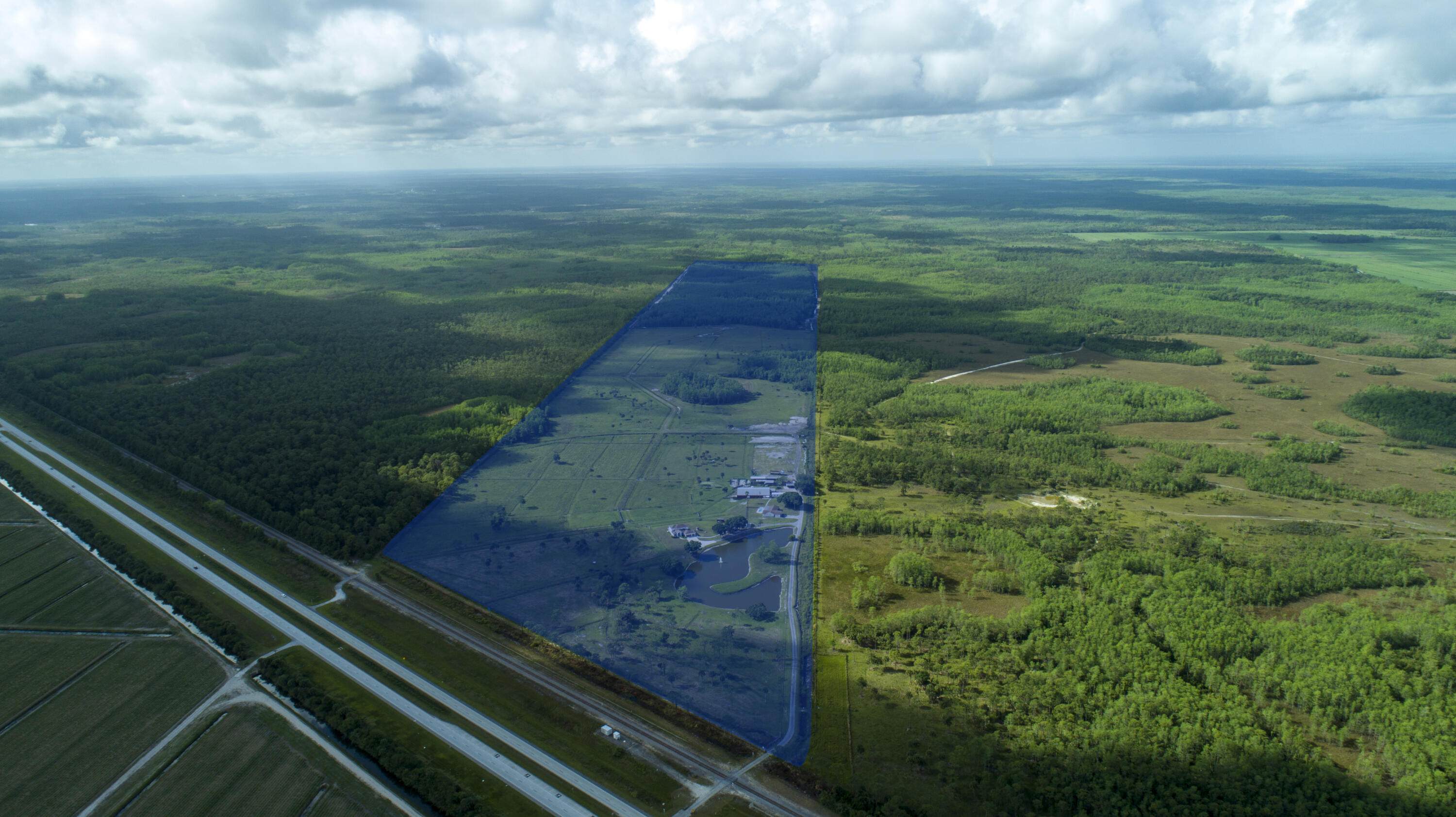 Once in a generation a property this remarkable becomes available.
This rare 206 acre private ranch is located in southern Martin county. Used as a private getaway, this property enjoys the benefits of bordering protected Florida lands. Extremely private with over 80,000+ acres encompassing Corbett and Dupuis Wildlife Management Areas bordering the ranch. Only a short drive to Jupiter and the Palm Beaches. Zoned Martin County A-2 with 106 acres that are cleared and cross fenced, currently being utilized for cattle grazing. The property has a pump station in place to aid in disbursement of storm water. Two concrete built homes, one of which is a 3 bed 2.5 bath totaling 2600 sqft. The second home is a 3 bed 2 bath pool home totaling 1800 sqft. There are multiple outbuildings in good condition along with a full sized military diesel, tools, farm equipment and hardware which all convey in the sale. The rear 100 acres are wooded and fenced with a network of trails. Deer, wild hogs, turkey, ducks and game birds including dove and snipe are among the abundant wildlife on the ranch. Numerous recreation and income producing opportunities exist including timber production, cattle grazing, a hunting outfit, retreat-style living, horseback riding and more. Survey available upon request.