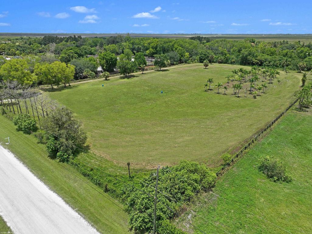 POSSIBLE SELLER FINANCING! Not much land left in Wellington's horse country! This 5 acre parcel is already significantly improved, partially filled & cleared. Located only a short distance away from the bridle path land bridge to the horse show venues- hack to WEF! Also just a short hack on trails to Wellington's Environmental Preserve -a 365-acre park with nature trails and a 3.6 mile perimeter equestrian trail. One of the last lots available! Ready for construction! City water and electrical available! The desirable equestrian community of Rustic Ranches Estates is conveniently located near shopping and other amenities, yet offers a quiet and private country setting with top rated Wellington schools and city water. Discover why so many professional equestrians are choosing Rustic Ranches!